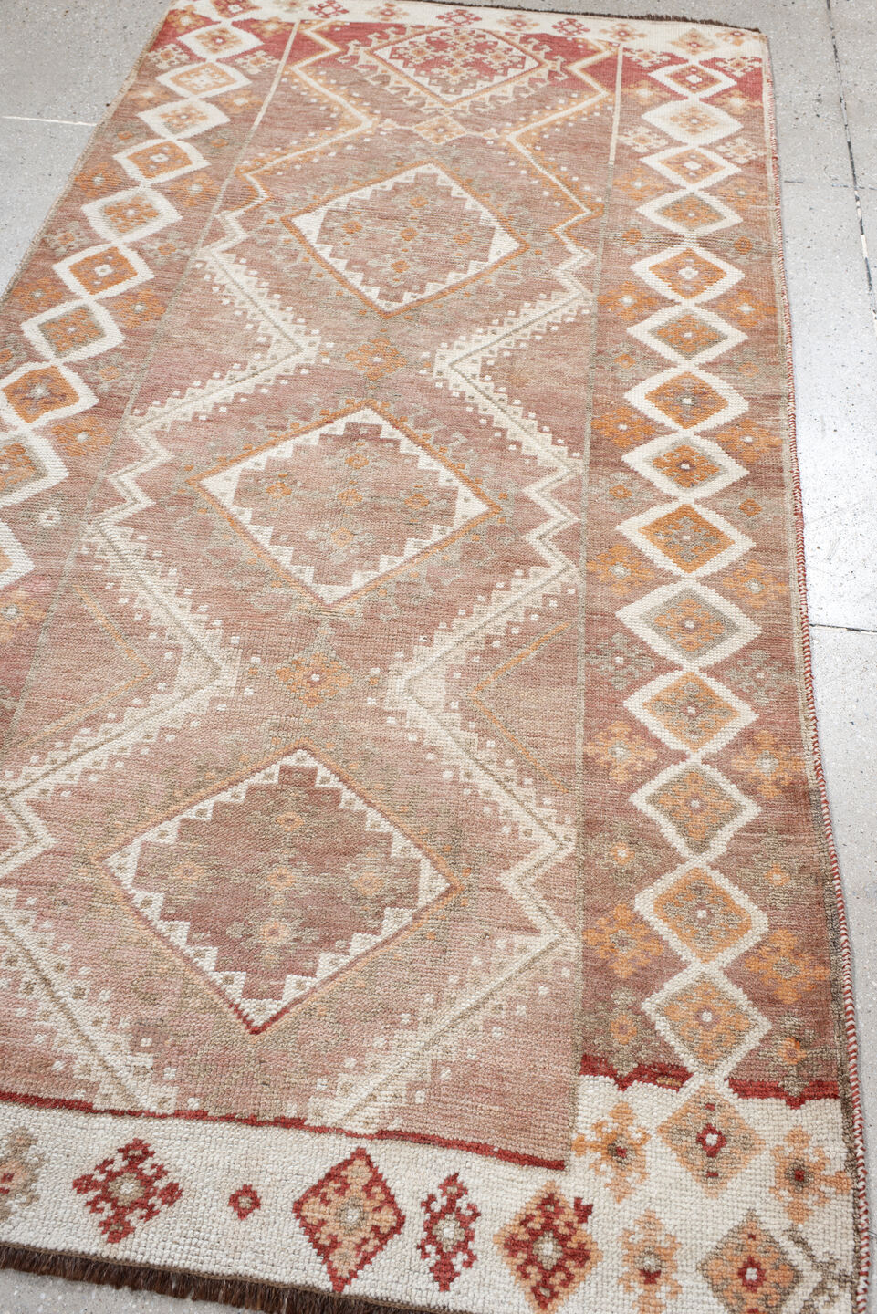 3' x 7' one-of-a-kind handmade vintage Gabbe runner rug. Color palette: brown, gray, light gray, off-white, orange, pink