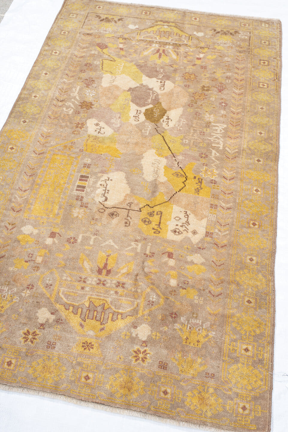 2' x 4' one-of-a-kind handmade vintage small size rug. Color palette: beige, ivory, gold, taupe, blush, camel, sage, rust
