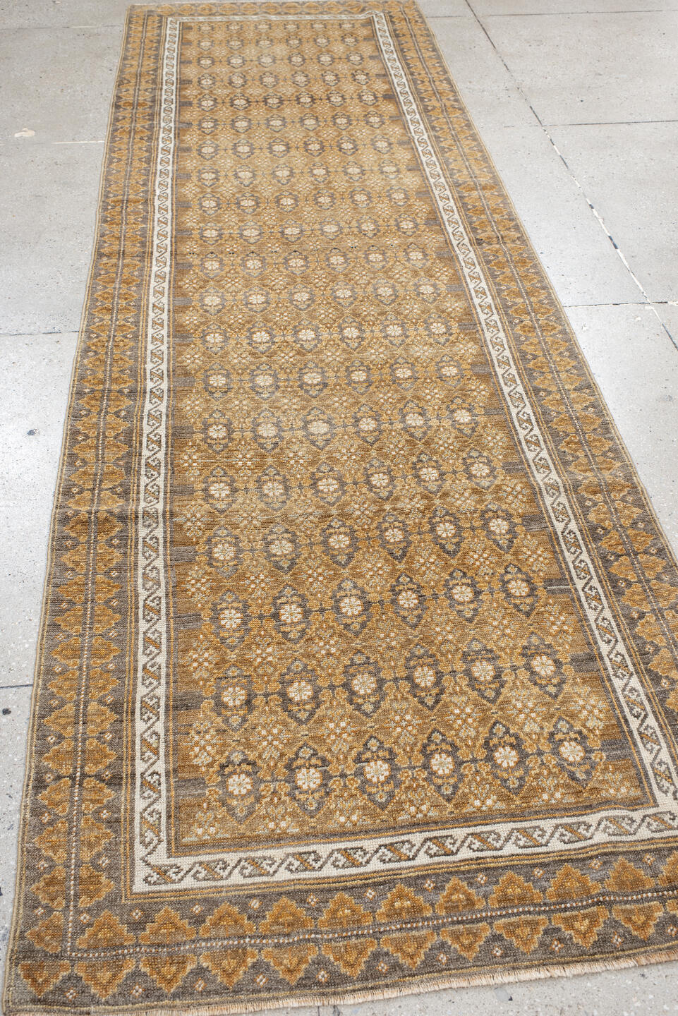 3' x 11' one-of-a-kind handmade vintage Anatol runner rug. Color palette: brown, gray, light gray, linen, off-white