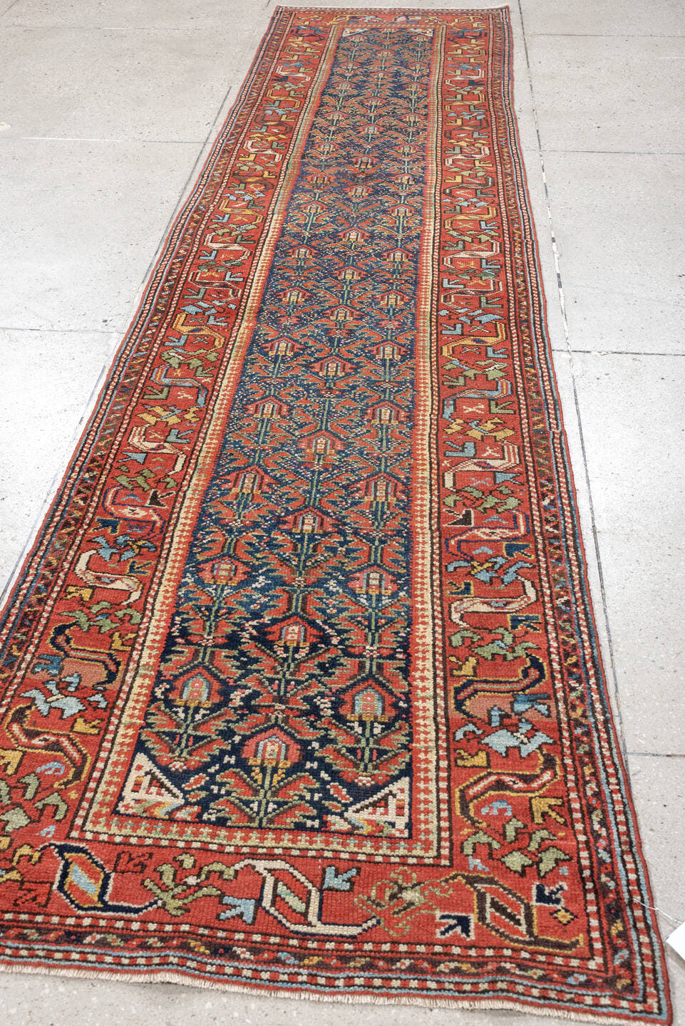 2' x 11' one-of-a-kind handmade antique Malayer runner rug. Color palette: navy, rust, ivory, camel, sage, terracotta