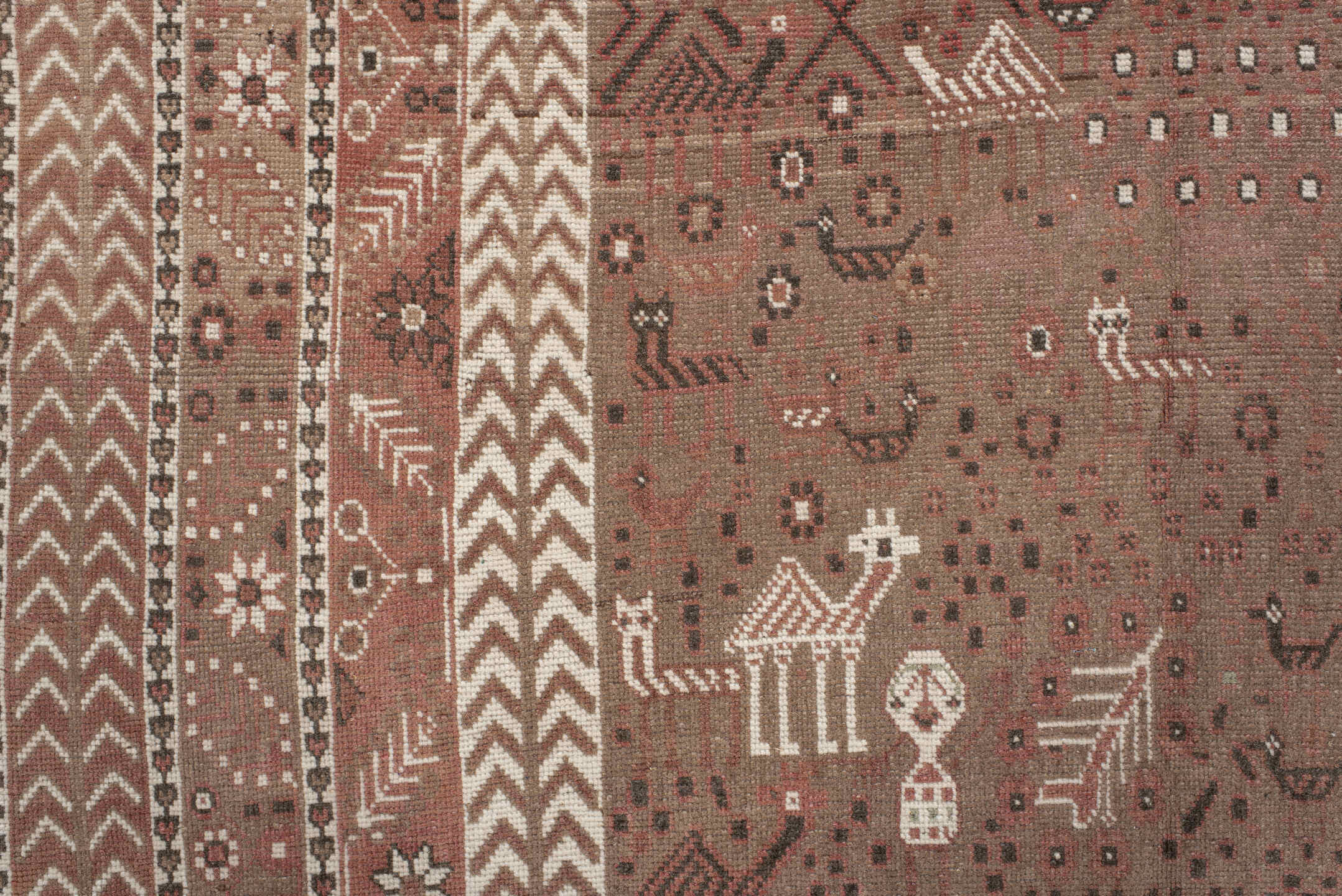 6' x 9' one-of-a-kind handmade vintage Sivas medium size rug. Color palette: brown, gray, light gray, off-white, pink