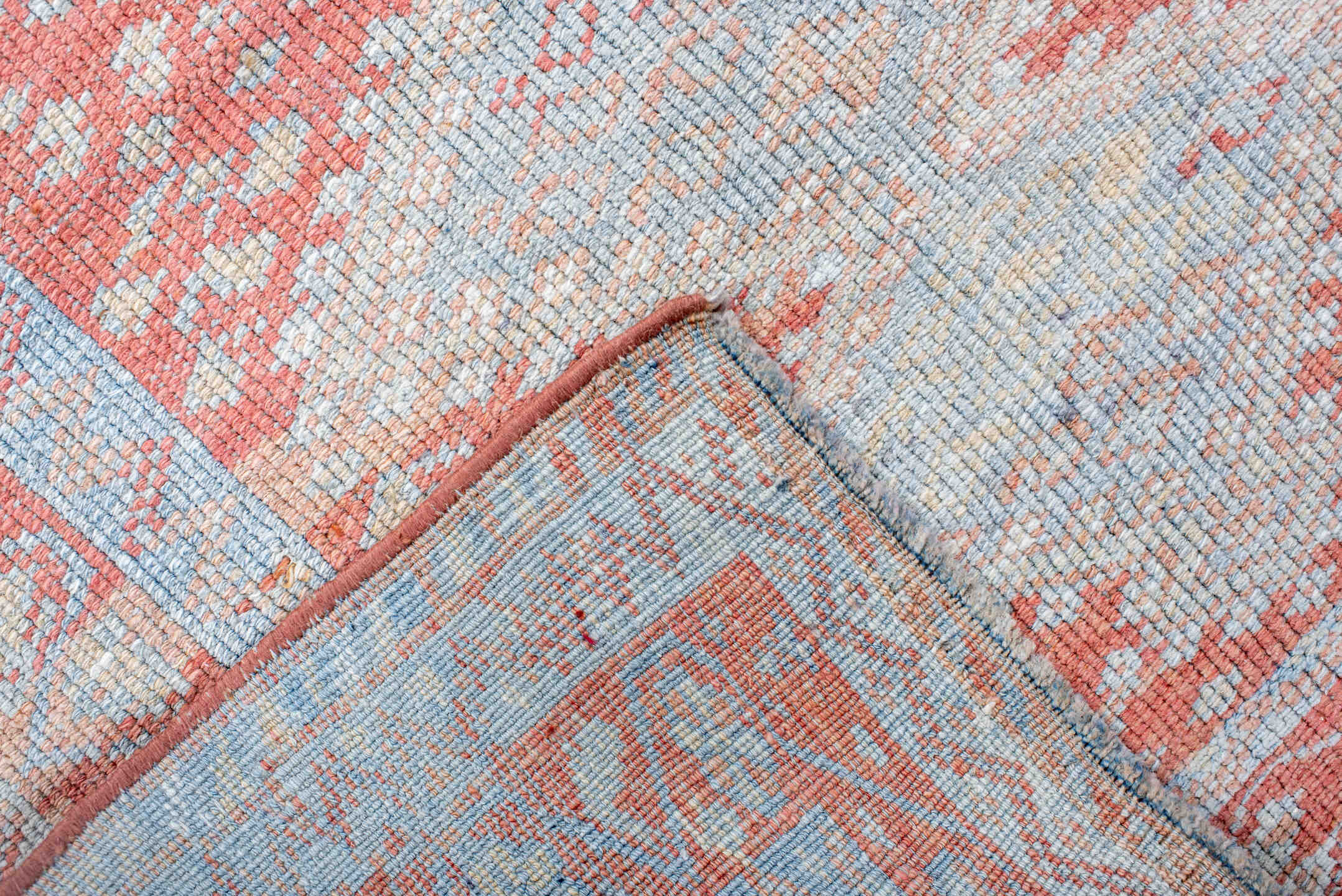 3' x 9' one-of-a-kind handmade antique Kurd runner rug. Color palette: ivory, sky blue, coral, rust, pale blue, salmon