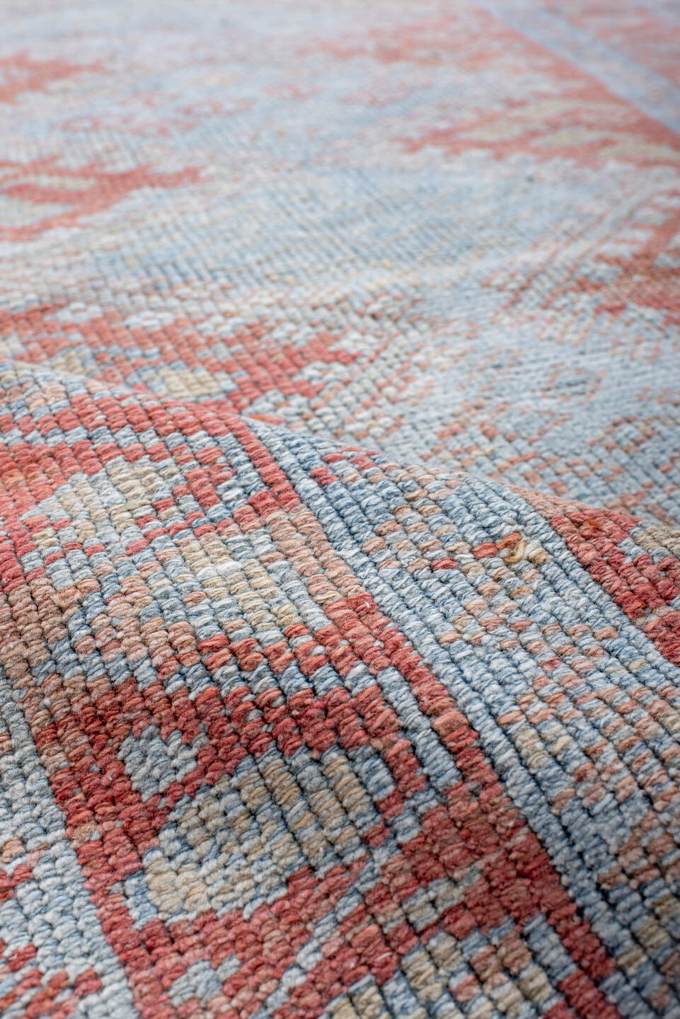 3' x 9' one-of-a-kind handmade antique Kurd runner rug. Color palette: ivory, sky blue, coral, rust, pale blue, salmon