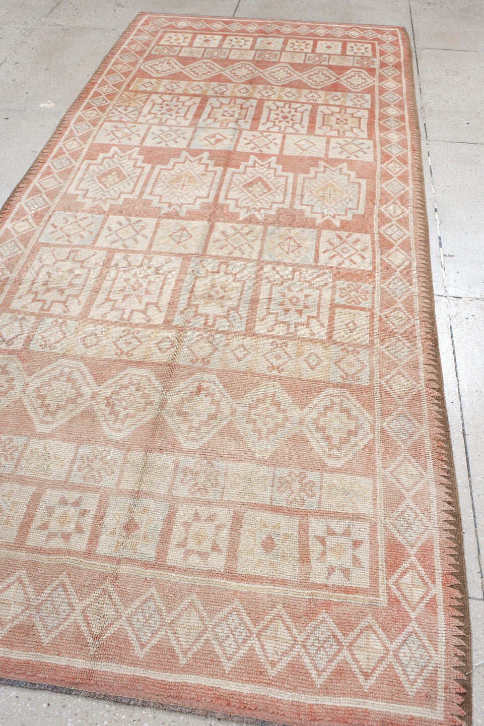 4' x 11' one-of-a-kind handmade antique Moroccan runner rug. Color palette: ivory, salmon, blush, peach, pink, terracotta