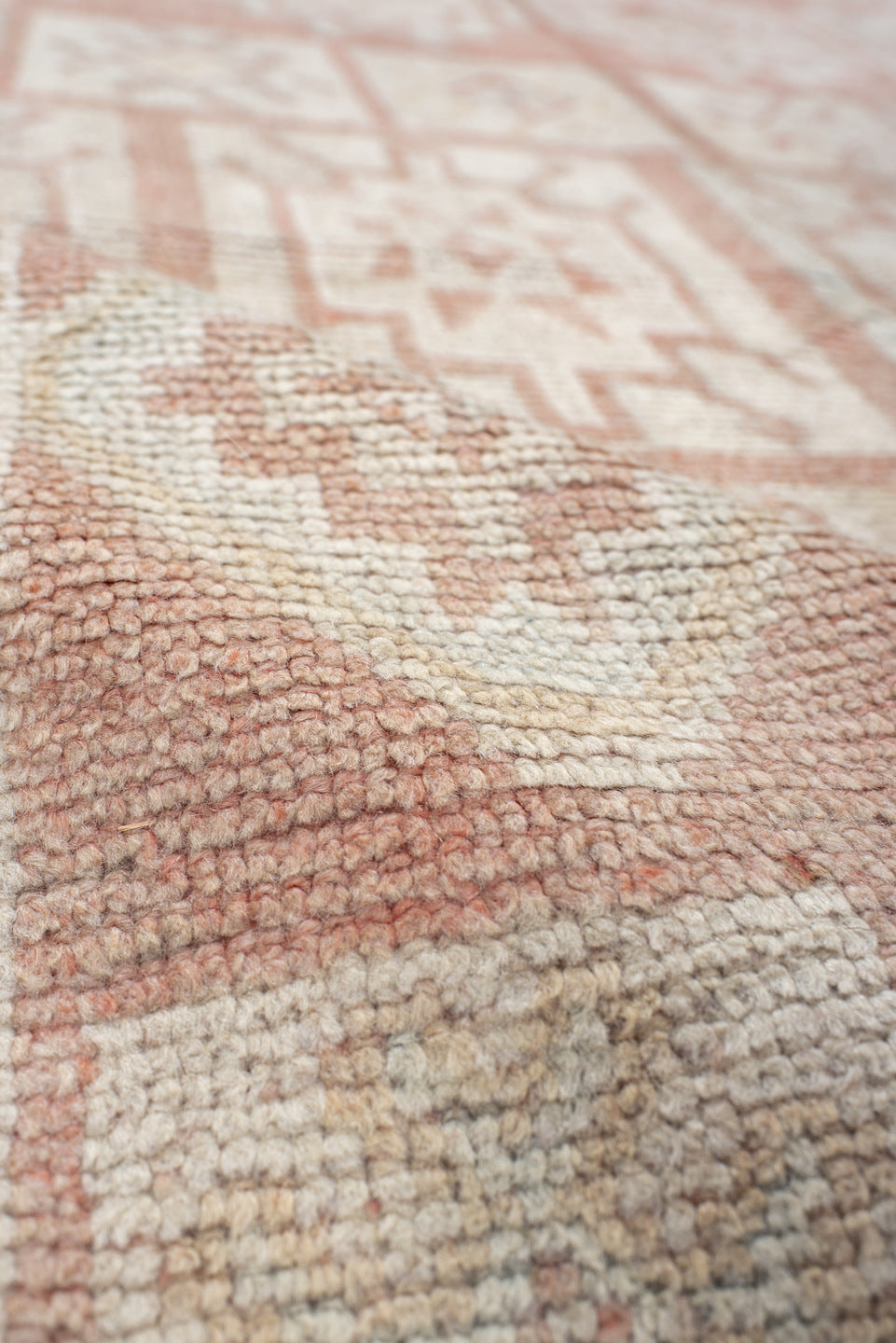 4' x 11' one-of-a-kind handmade antique Moroccan runner rug. Color palette: ivory, salmon, blush, peach, pink, terracotta