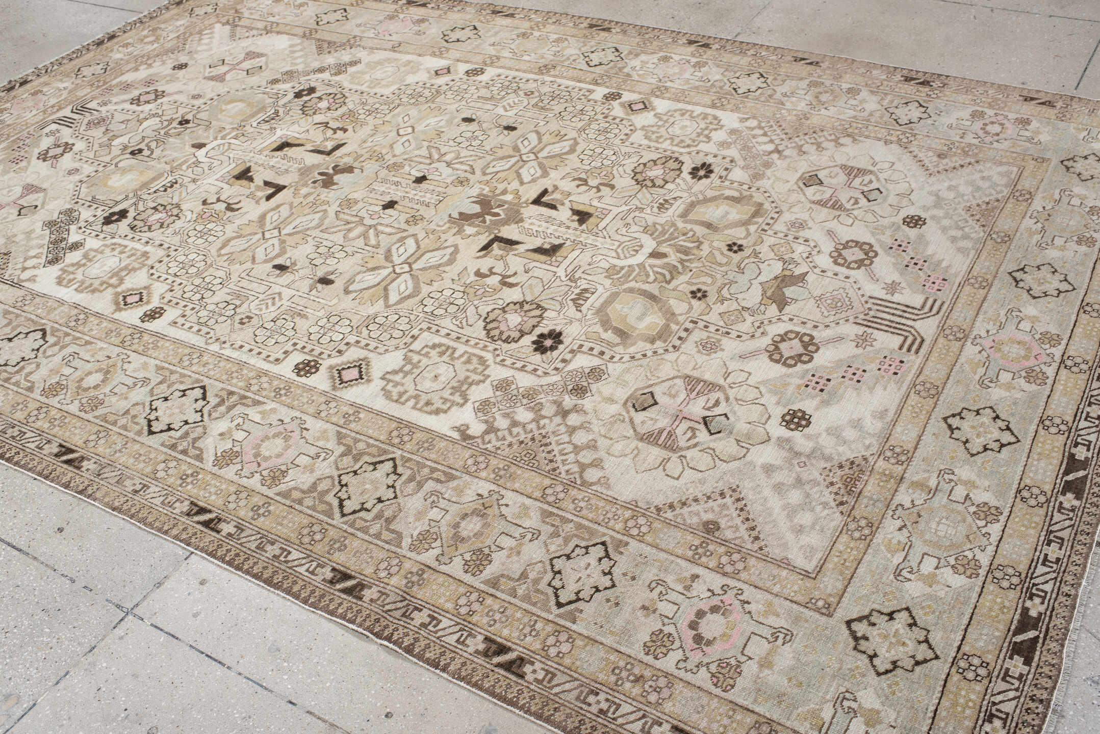 7' x 10' one-of-a-kind handmade antique Ardebil large size rug. Color palette: ivory, taupe, camel, brown, blush, beige
