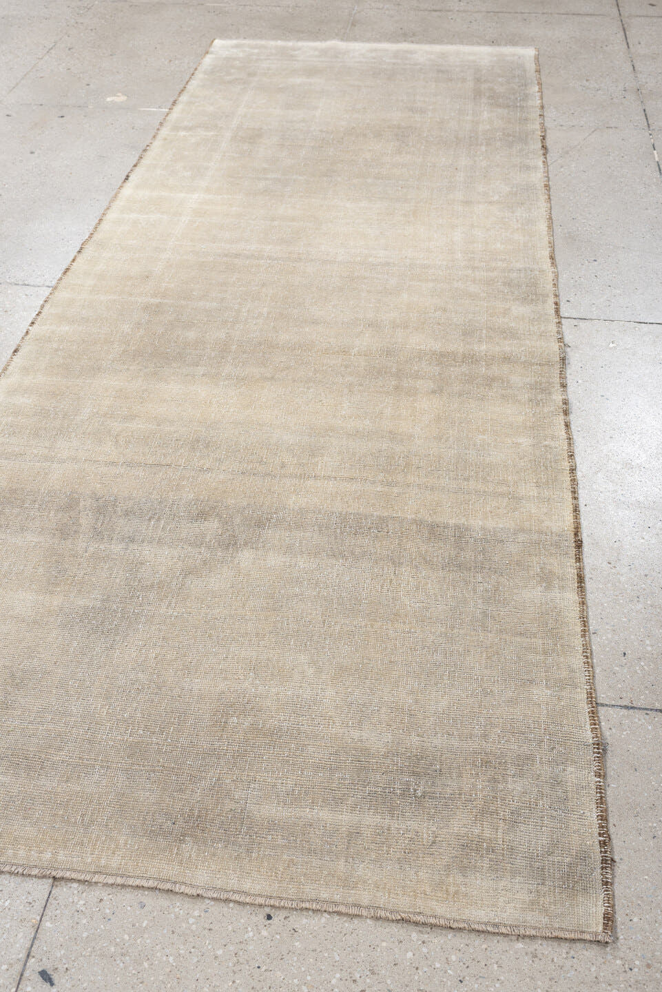 9' x 3' one-of-a-kind handmade antique Belouch rug. Color palette: ivory, taupe, cream, beige, camel, light gray, gray