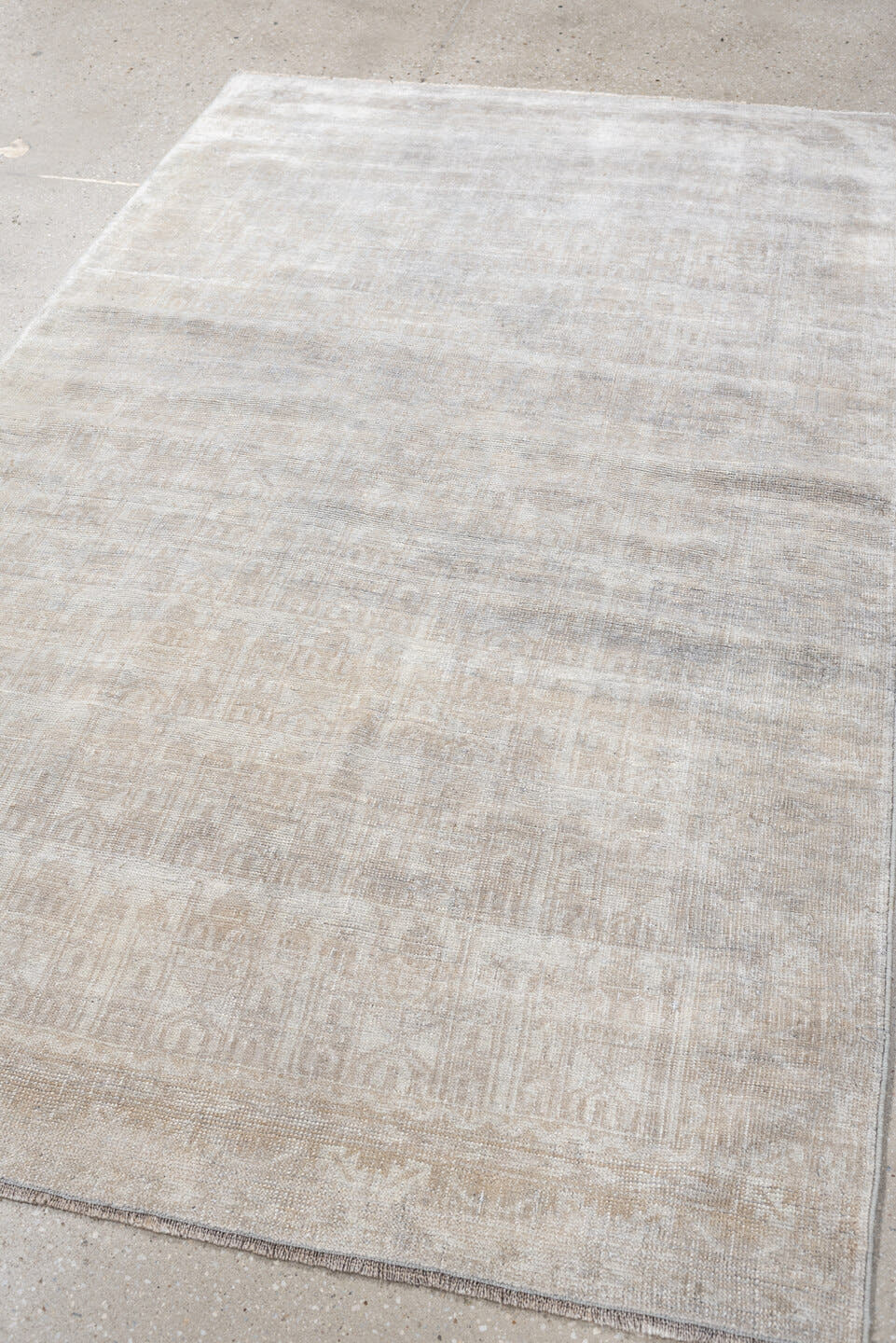 3' x 6' one-of-a-kind handmade antique Belouch small size rug. Color palette: ivory, taupe, silver gray, cream, beige