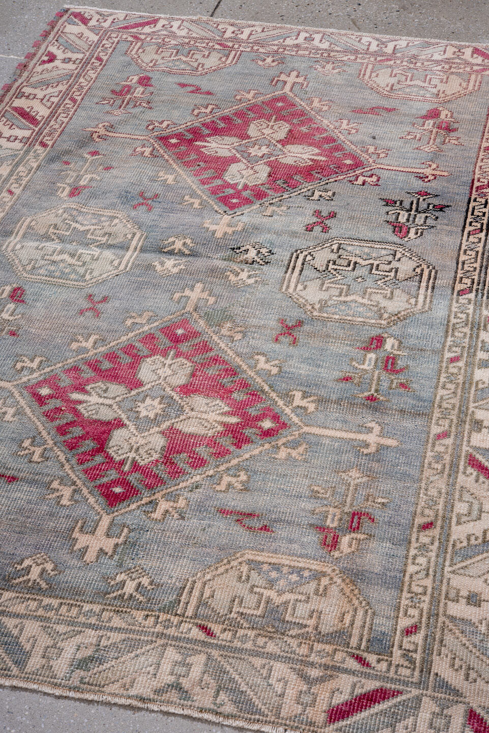 4' x 5' one-of-a-kind handmade vintage Anatolian small size rug. Color palette: ivory, blue, rose, taupe, slate, charcoal