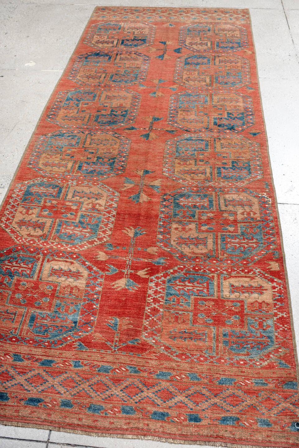 3' x 9' one-of-a-kind handmade antique Afghan runner rug. Color palette: rust, terra cotta, ivory, teal, sky blue, rose