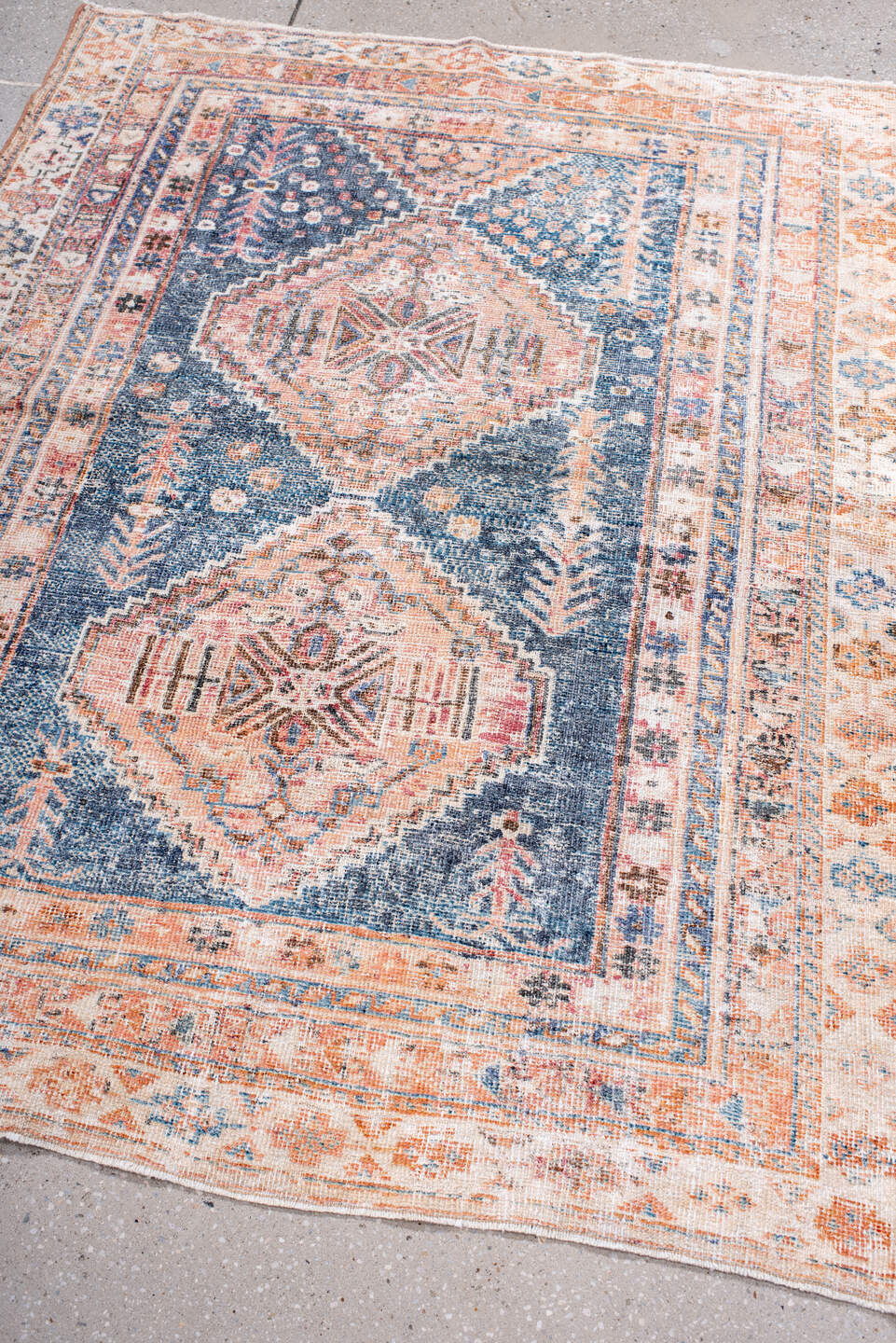 4' x 5' one-of-a-kind handmade antique Afshar small size rug. Color palette: ivory, blue, rust, coral, slate, peach