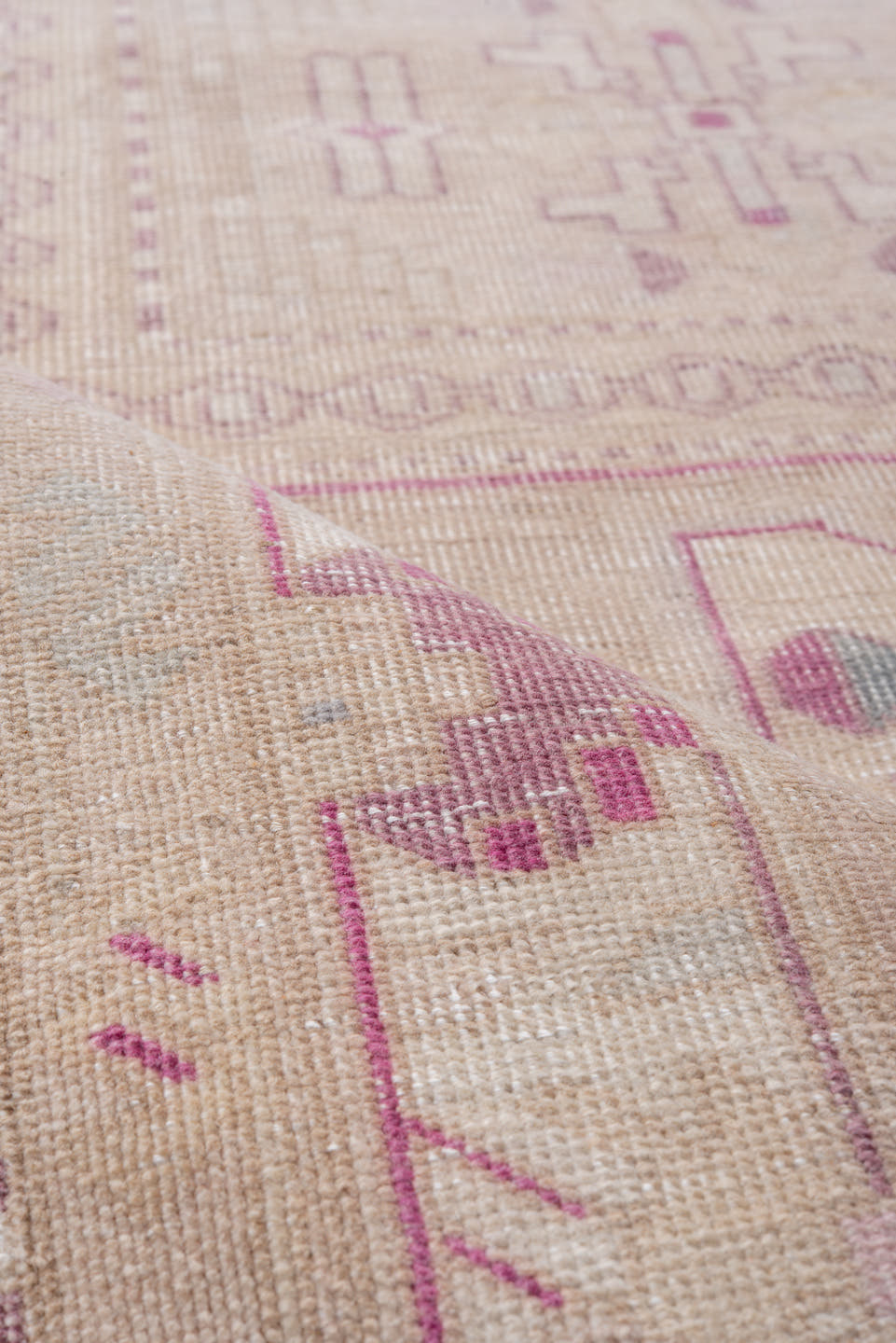 3' x 10' one-of-a-kind handmade antique runner rug. Color palette: ivory, blush, rose, taupe, lavender, pink, red, beige
