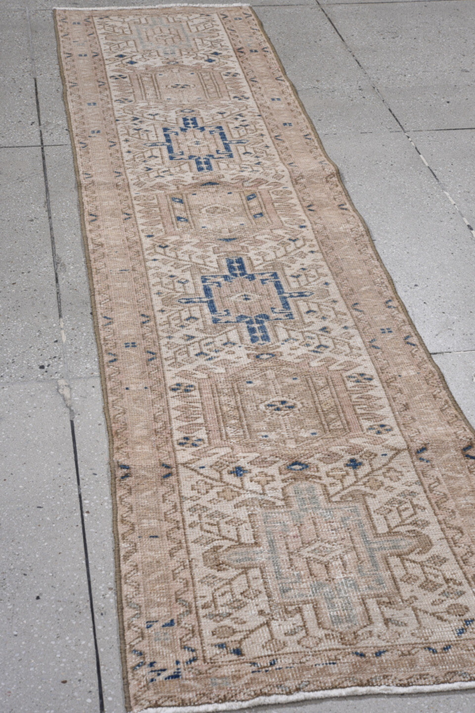 2' x 8' one-of-a-kind handmade antique Karaje runner rug. Color palette: beige, ivory, taupe, slate, navy, camel, gray, blue