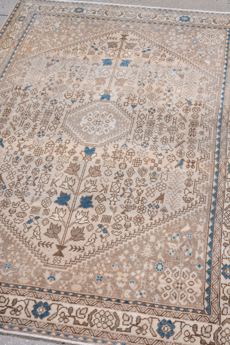 3' x 5' one-of-a-kind handmade vintage Joshegan small size rug. Color palette: taupe, ivory, sky blue, beige, brown, gray