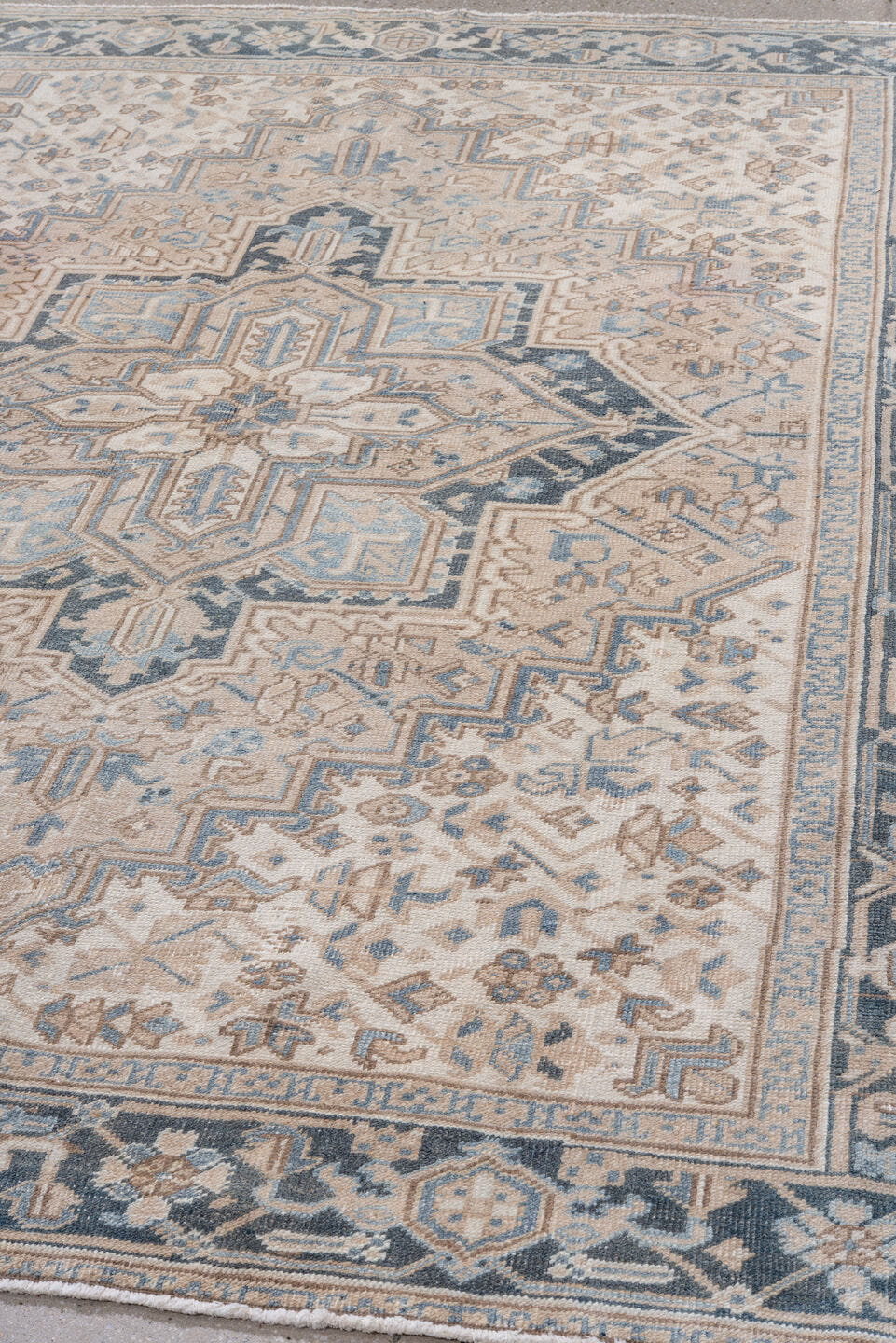 6' x 7' one-of-a-kind handmade vintage Heriz rug. Color palette: ivory, blue, taupe, charcoal, cream, slate, beige, gray