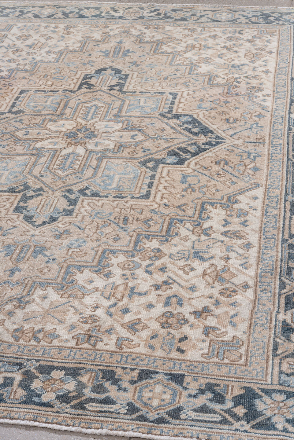 6' x 7' one-of-a-kind handmade vintage Heriz rug. Color palette: ivory, blue, taupe, charcoal, cream, slate, beige, gray