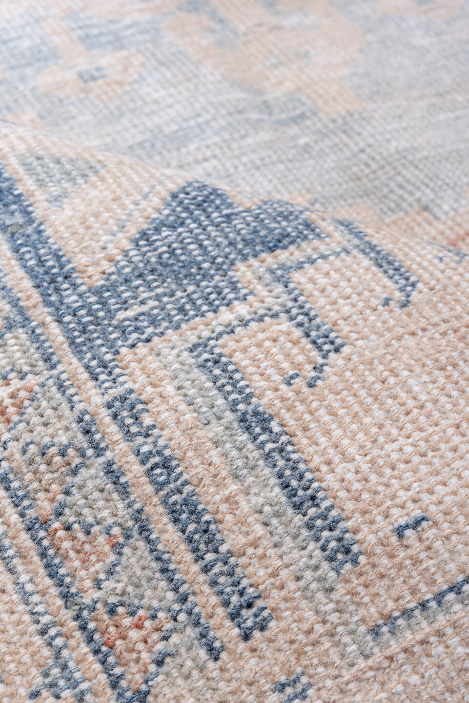 4' x 7' one-of-a-kind handmade vintage Veece rug. Color palette: ivory, pale blue, blush, sky blue, faded coral, light blue