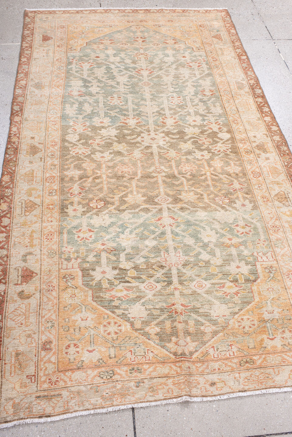 3' x 7' one-of-a-kind handmade antique Malayer rug. Color palette: ivory, sage, sand, terra cotta, taupe, camel, rose, green