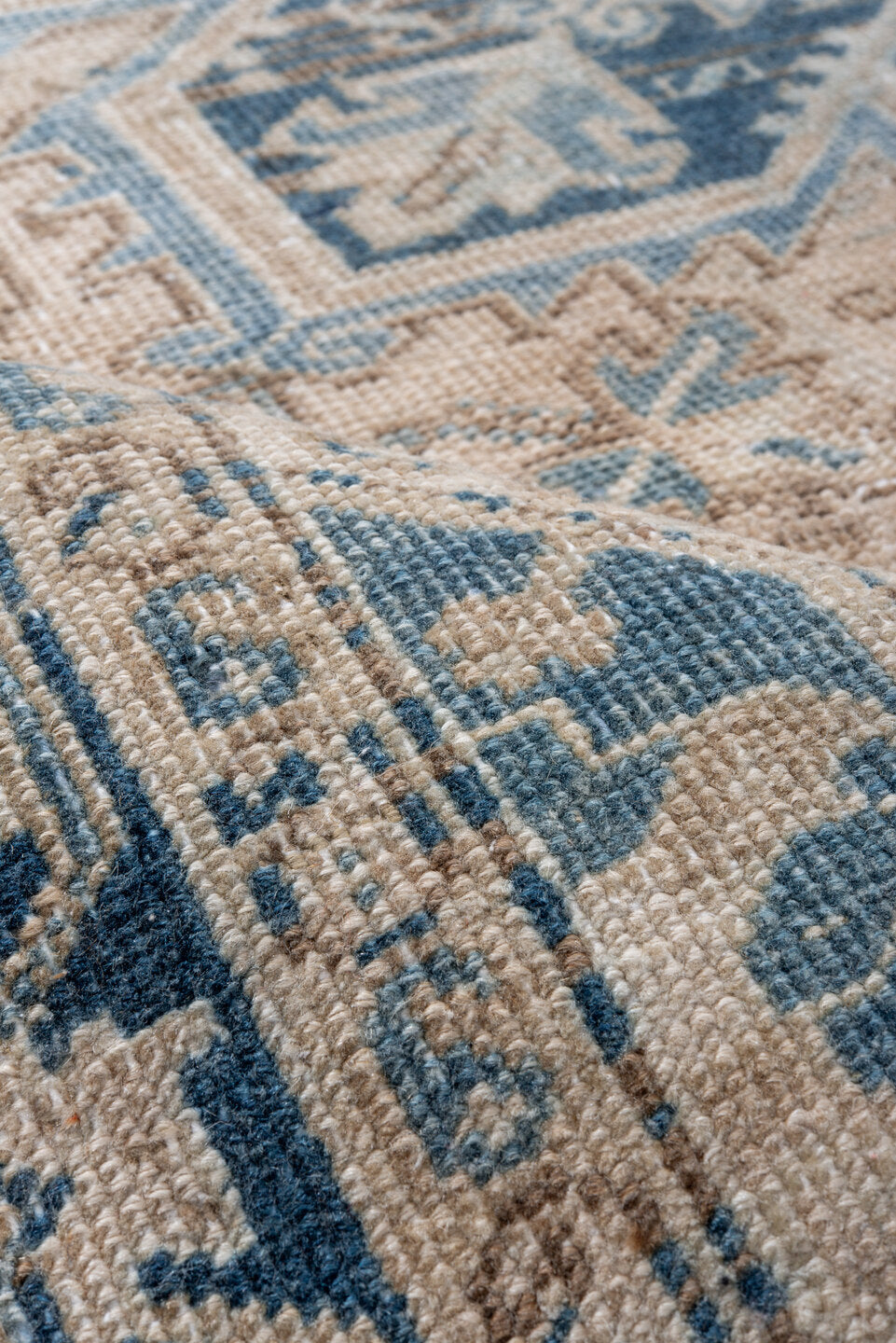 6' x 8' one-of-a-kind handmade antique Heriz medium size rug. Color palette: ivory, blue, navy, beige, taupe, camel, gray