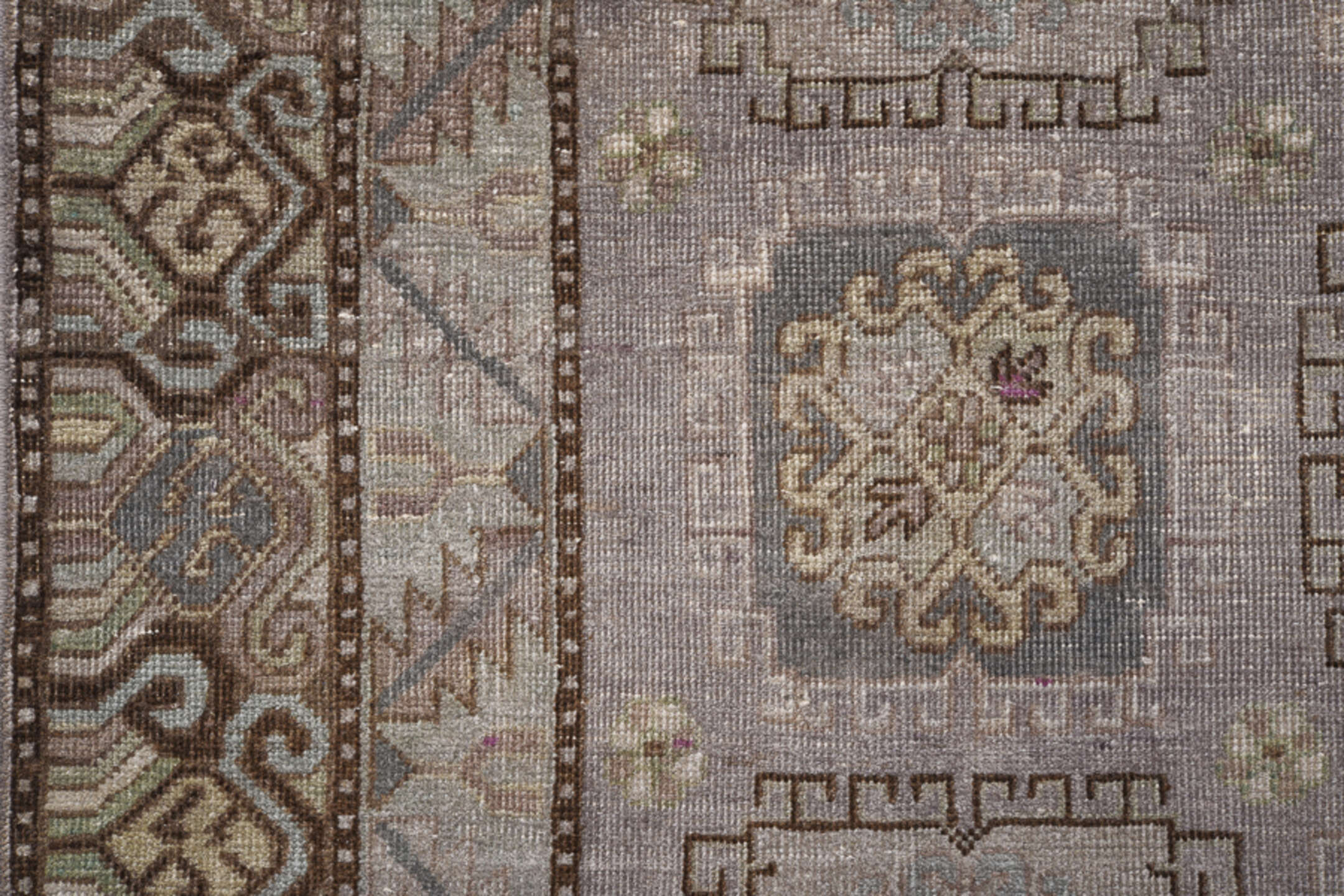 4' x 8' one-of-a-kind handmade vintage Khotan rug. Color palette: brown, dim gray, gray, light gray, pink