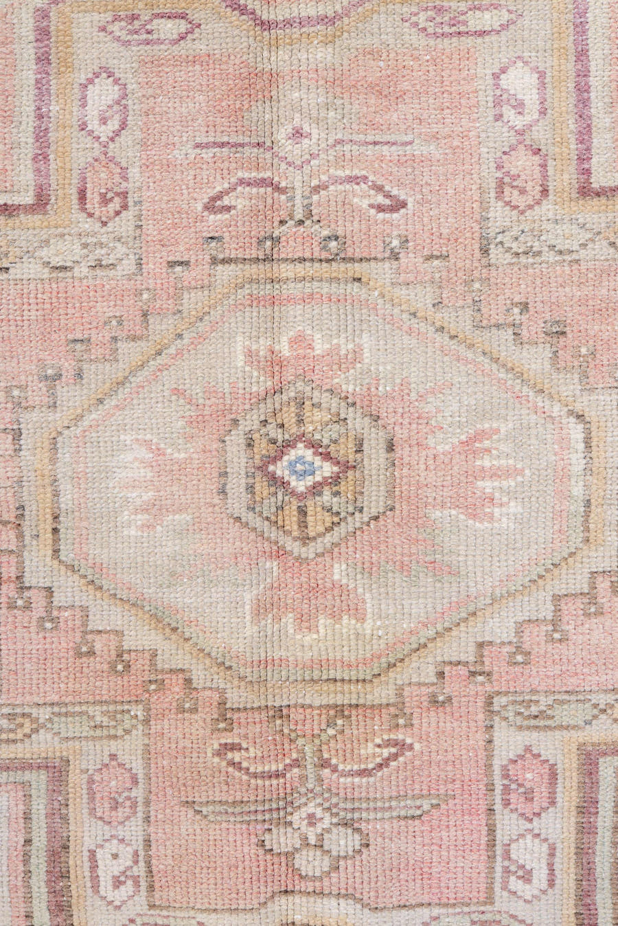 4' x 8' one-of-a-kind handmade antique Caucasian rug. Color palette: ivory, blush, rose, sky blue, taupe, dusty pink, sage