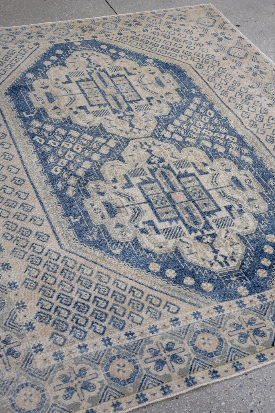 4' x 5' one-of-a-kind handmade antique Afshar small size rug. Color palette: ivory, indigo, slate, cream, pale blue, purple