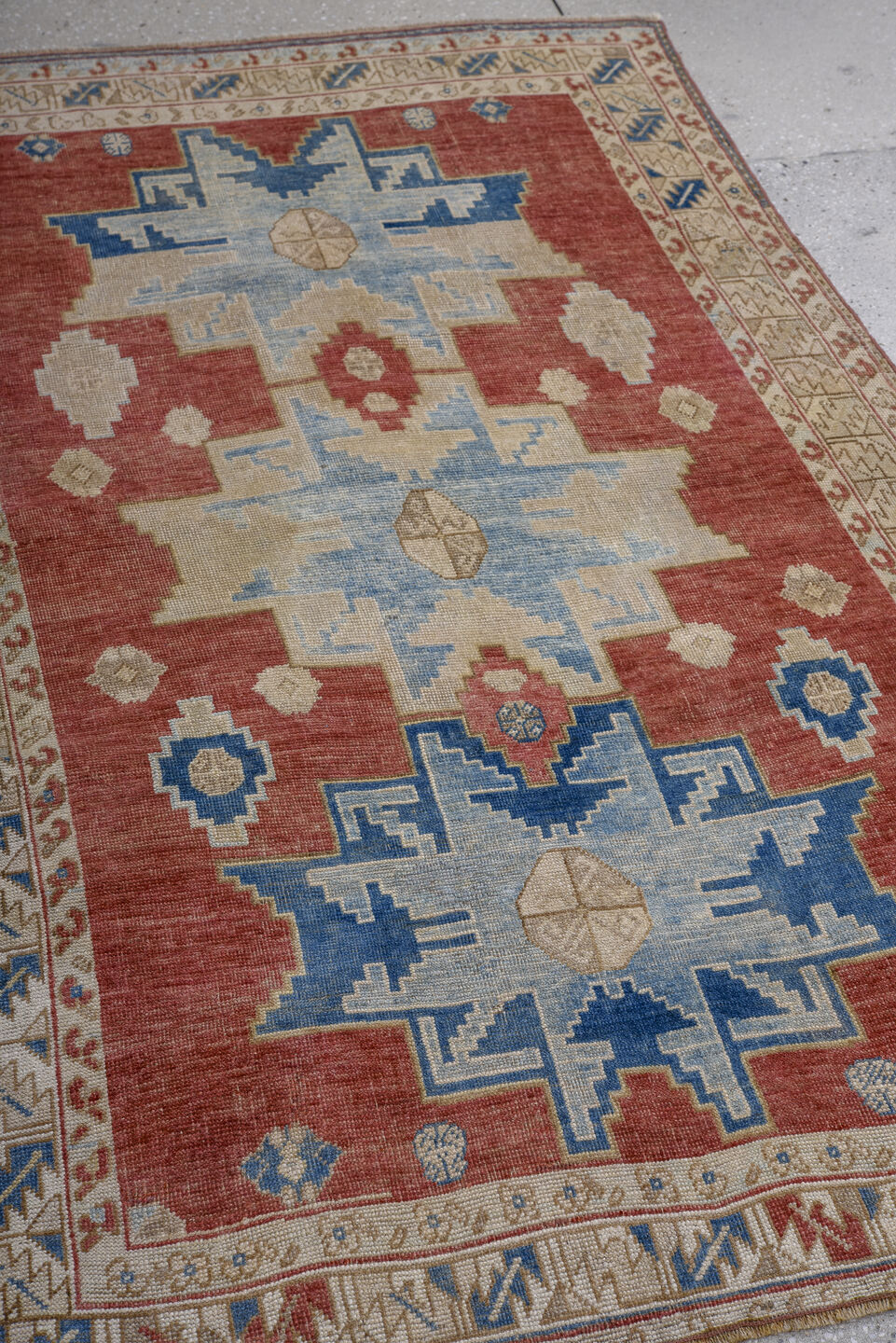 3' x 5' one-of-a-kind handmade vintage Kazak small size rug. Color palette: blue, brown, dark gray, gray, light gray, red