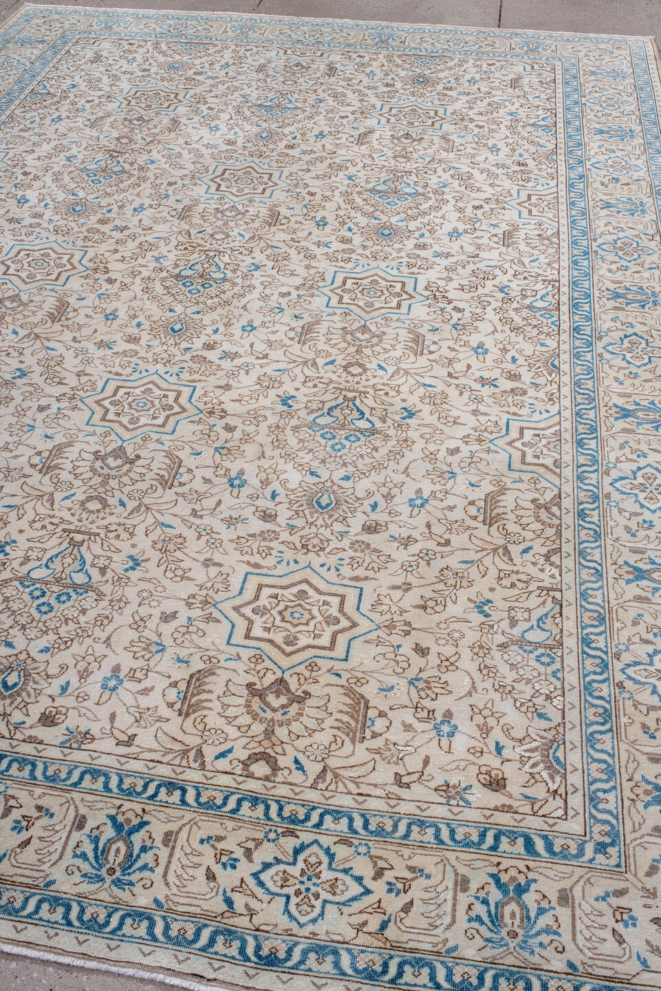 7' x 11' one-of-a-kind handmade antique Tabriz large size rug. Color palette: ivory, sky blue, taupe, beige, camel