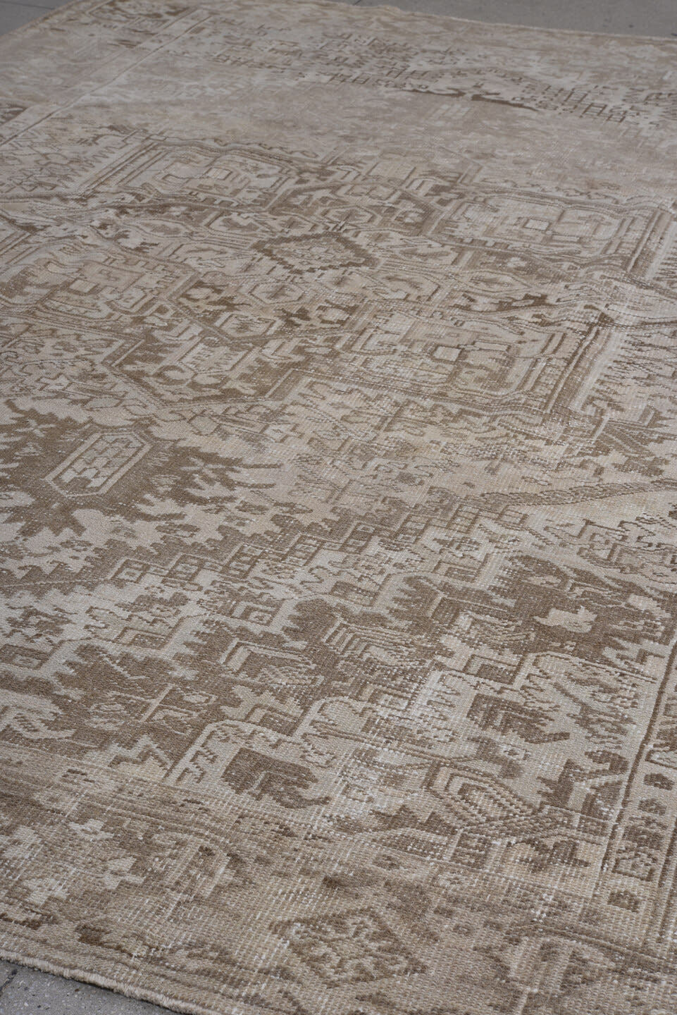 8' x 11' one-of-a-kind handmade antique Heriz large size rug. Color palette: taupe, ivory, beige, camel, brown, gray