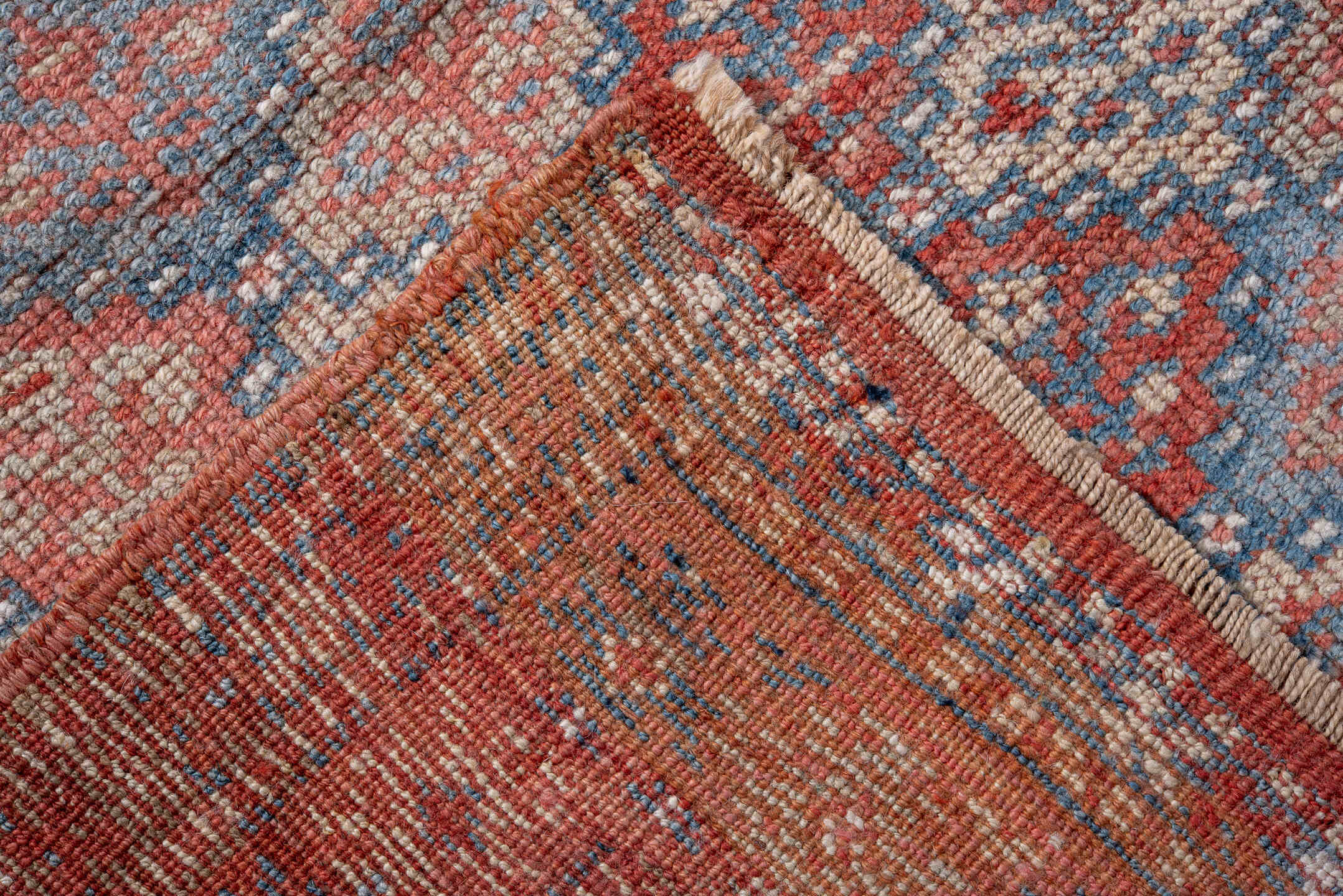 5' x 7' one-of-a-kind handmade antique Kurd rug. Color palette: coral, dusty blue, ivory, rust, rose, taupe, terracotta