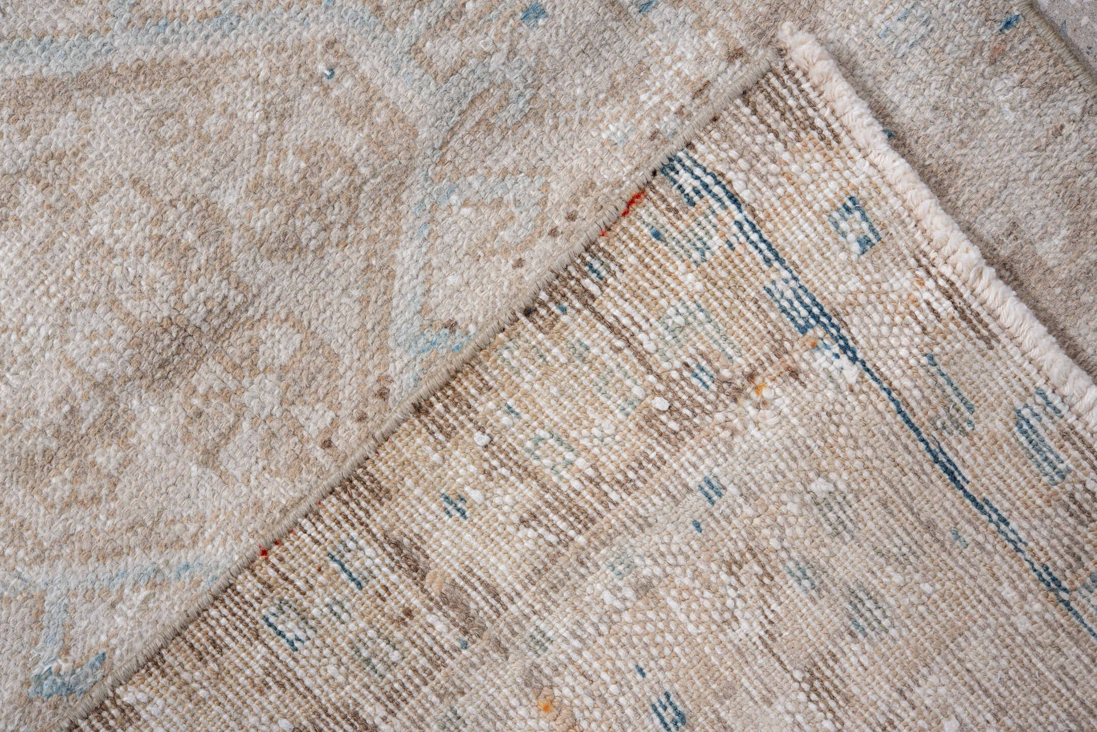 2' x 8' one-of-a-kind handmade vintage Karaje runner rug. Color palette: ivory, taupe, sky_blue, beige, slate_blue, camel