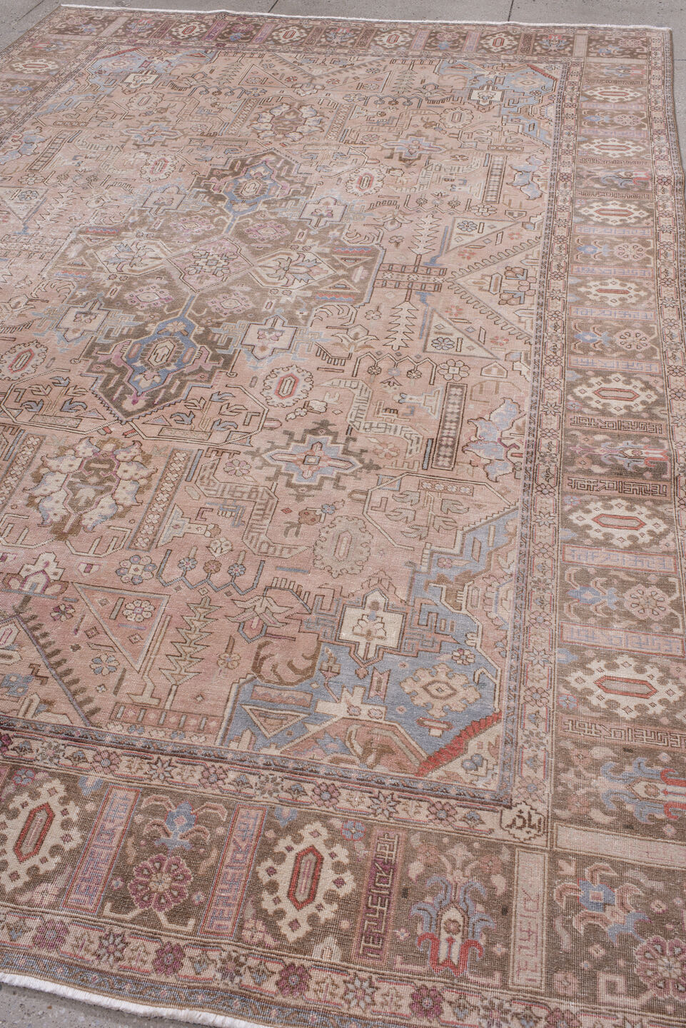 7' x 11' one-of-a-kind handmade antique Heriz large size rug. Color palette: taupe, rose, dusty blue, ivory, brown