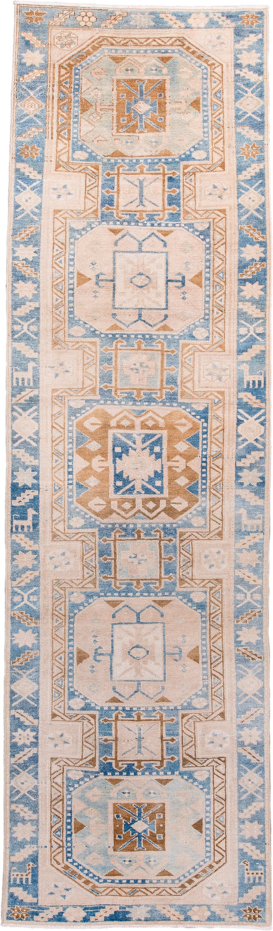 2' x 10' one-of-a-kind handmade antique Heriz runner rug. Color palette: ivory, sky blue, camel, light blue, taupe, brown