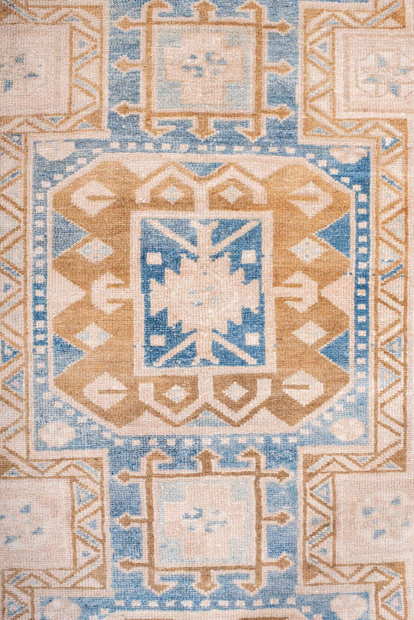 2' x 10' one-of-a-kind handmade antique Heriz runner rug. Color palette: ivory, sky blue, camel, light blue, taupe, brown