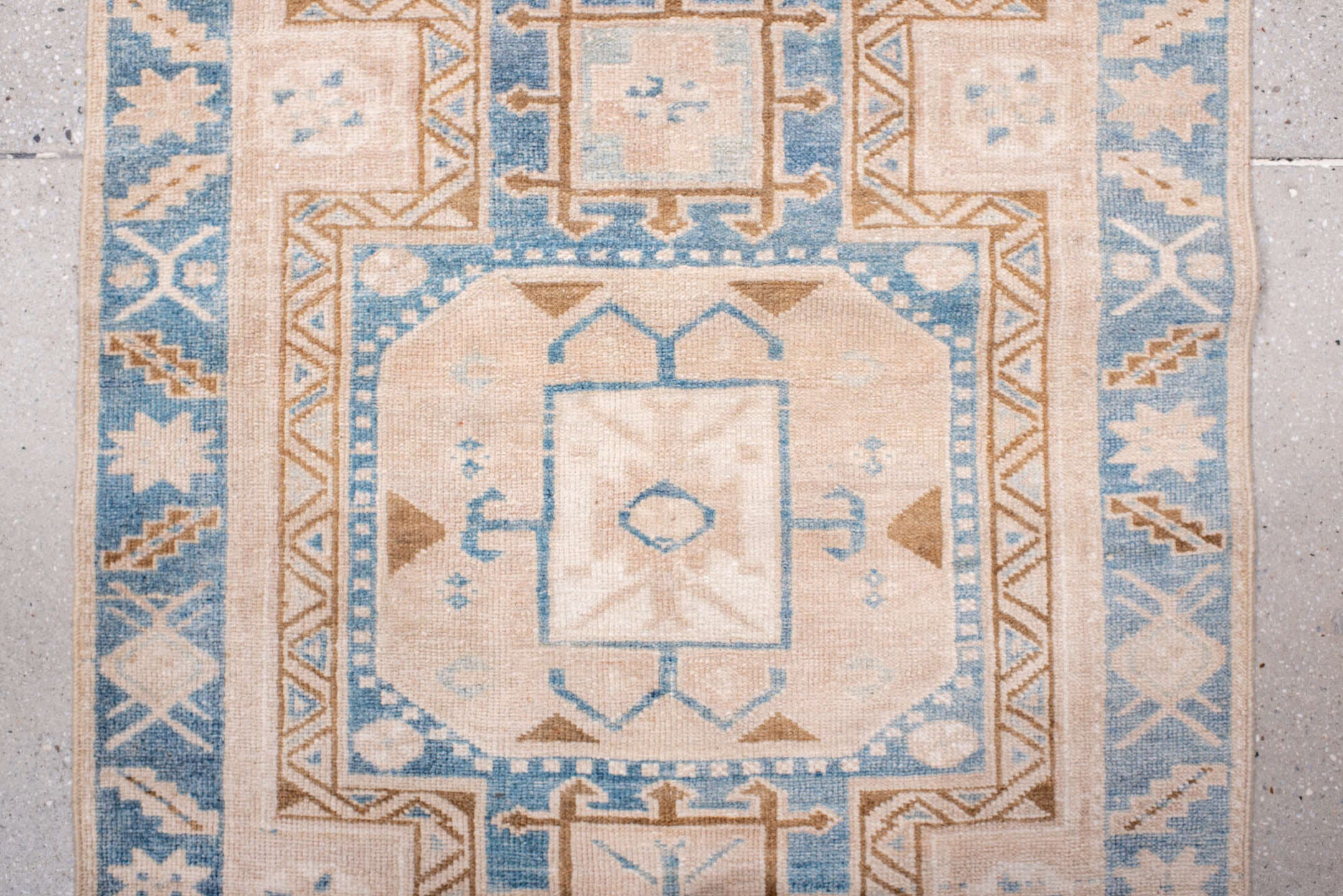 2' x 10' one-of-a-kind handmade antique Heriz runner rug. Color palette: ivory, sky blue, camel, light blue, taupe, brown