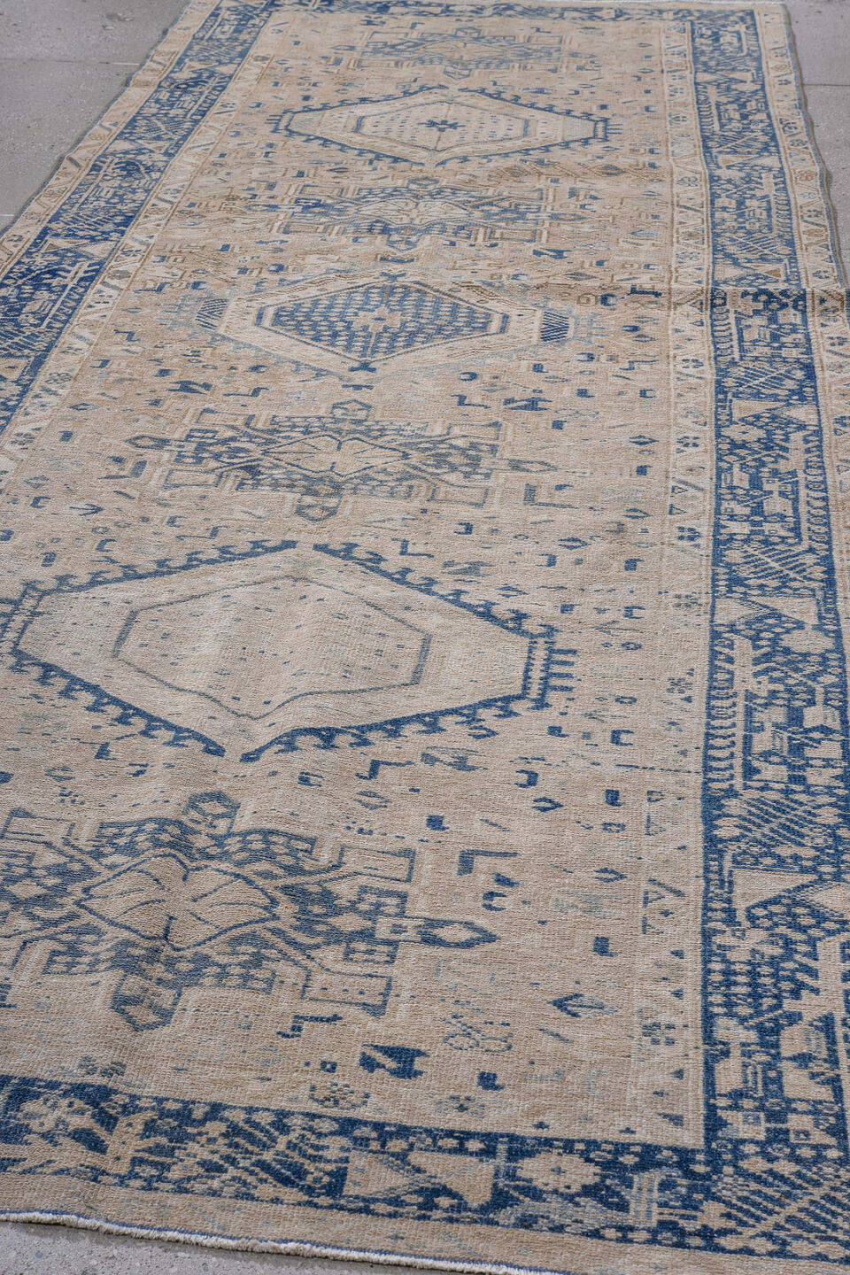 4' x 12' one-of-a-kind handmade antique Karaje runner rug. Color palette: ivory, indigo, slate, taupe, cream, purple, gray