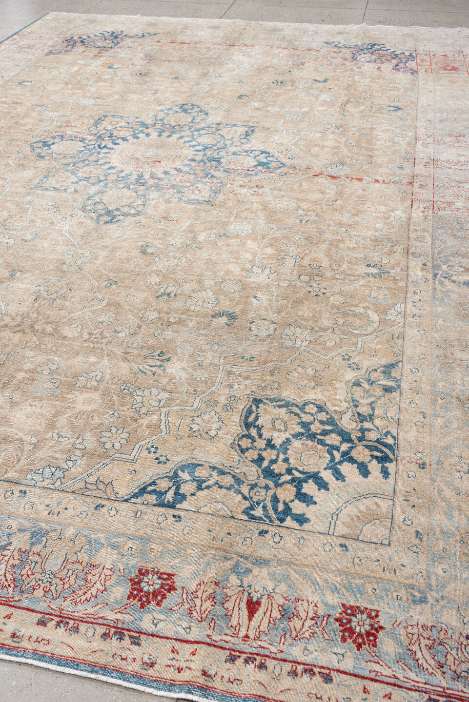 9' x 13' one-of-a-kind handmade vintage Tabriz large size rug. Color palette: ivory, pale blue, beige, muted terracotta