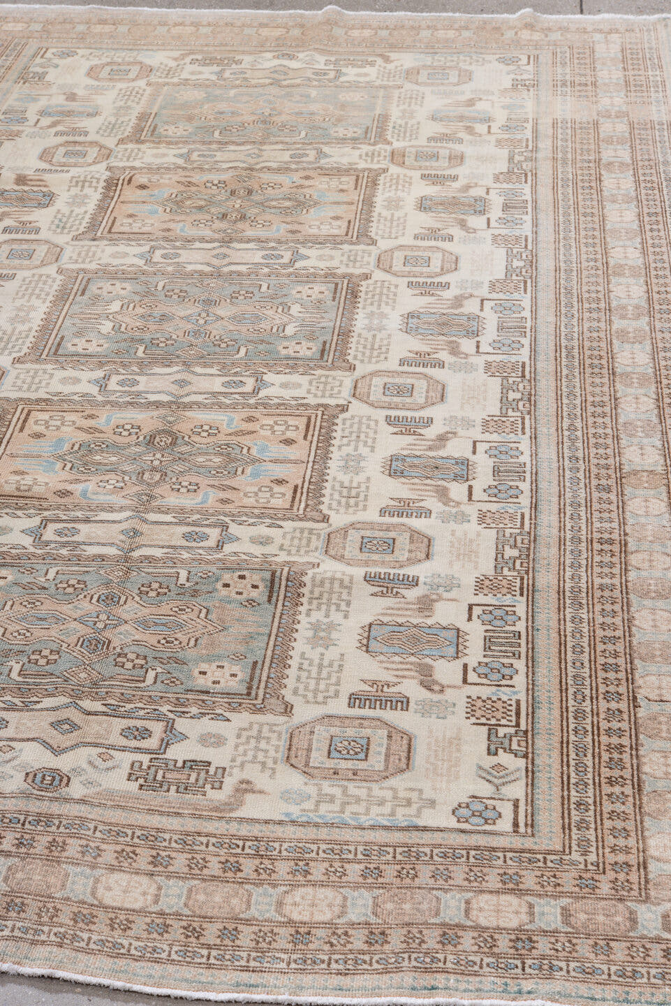 5' x 8' one-of-a-kind handmade antique Ardebil medium size rug. Color palette: ivory, taupe, sand, pale blue, camel, beige