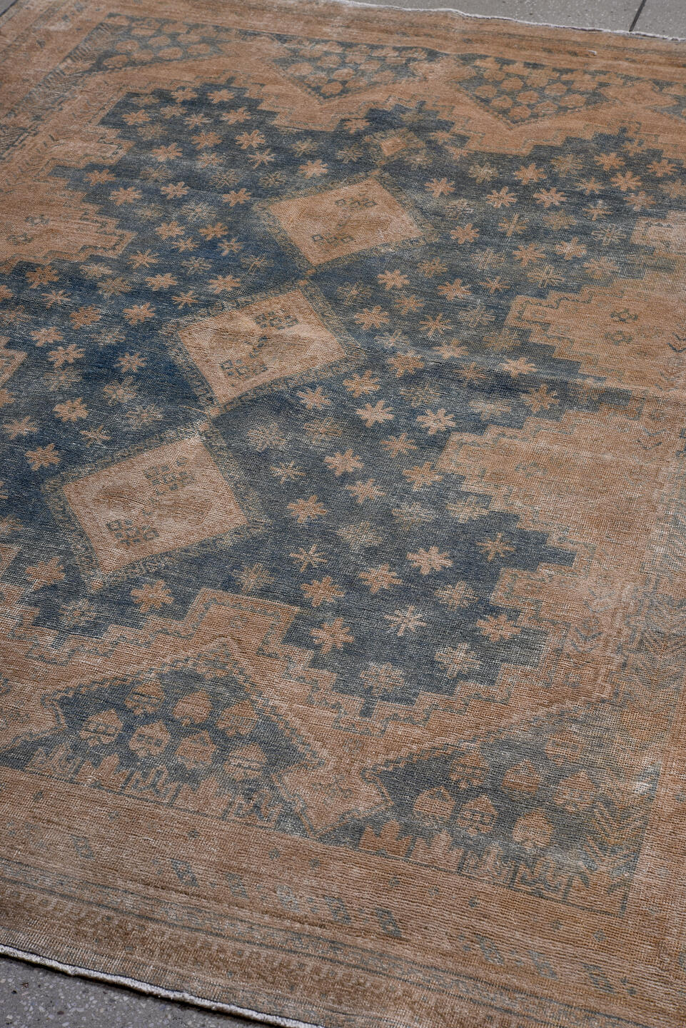 5' x 7' one-of-a-kind handmade antique Afshar rug. Color palette: camel, blue, sand, taupe, ivory, slate, beige, gray