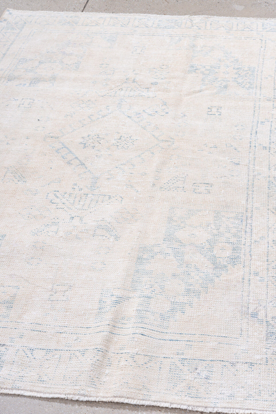 4' x 6' one-of-a-kind handmade antique Veece small size rug. Color palette: ivory, pale blue, cream, light blue