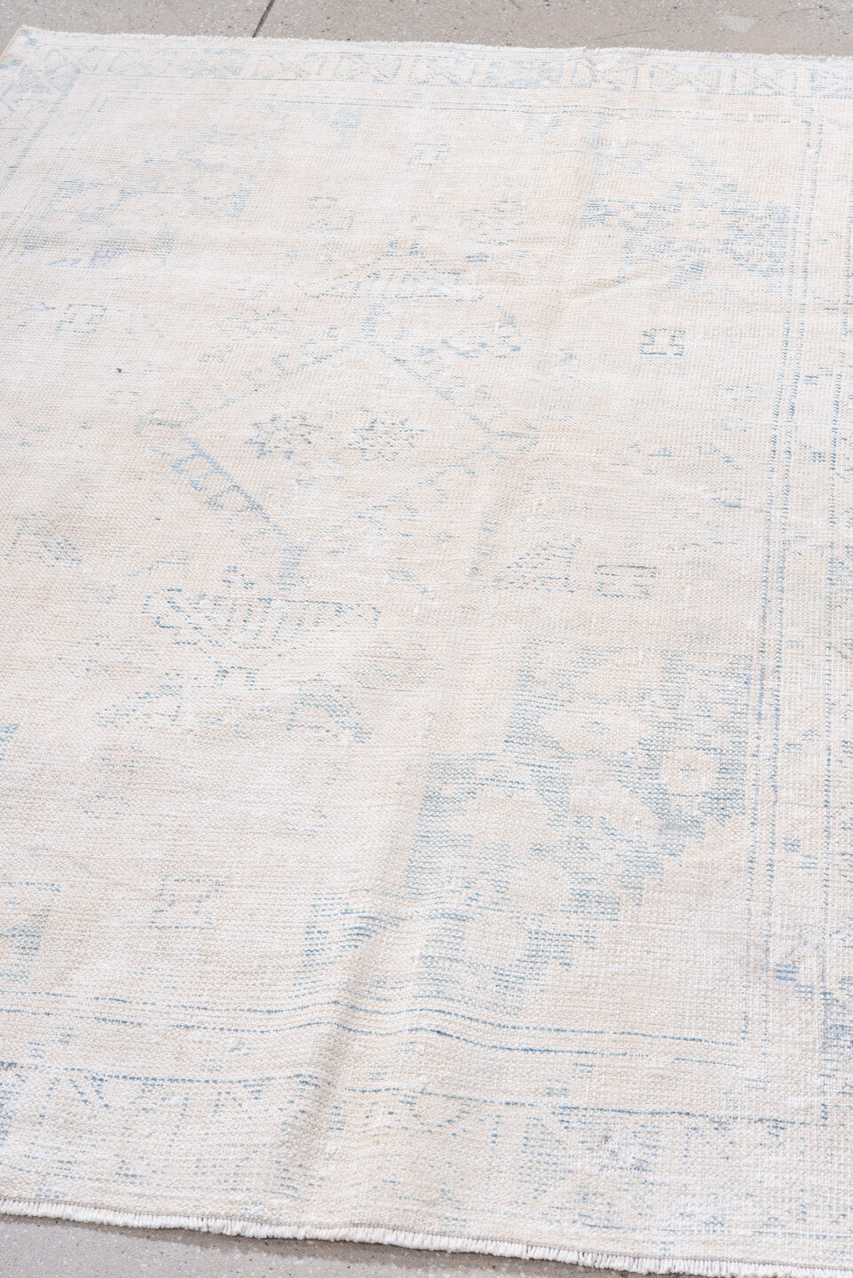 4' x 6' one-of-a-kind handmade antique Veece small size rug. Color palette: ivory, pale blue, cream, light blue