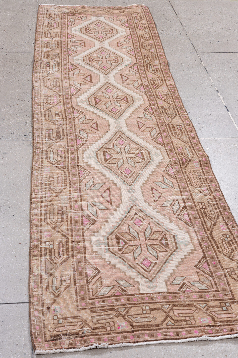 2' x 9' one-of-a-kind handmade vintage Sarab runner rug. Color palette: brown, gray, light gray, misty rose, off-white, pink