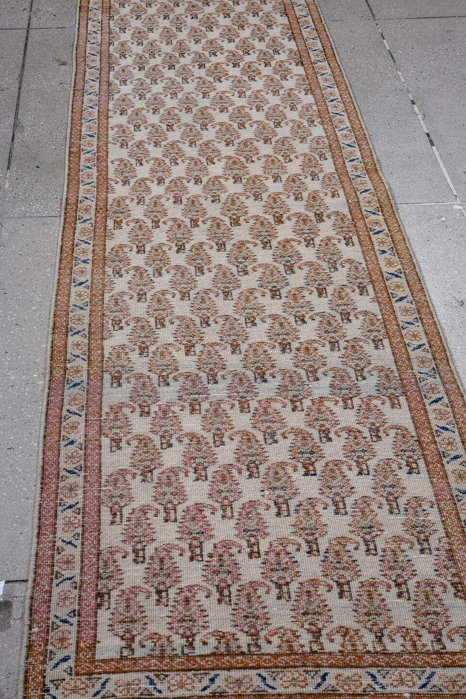 2' x 8' one-of-a-kind handmade antique Tabriz runner rug. Color palette: ivory, rust, camel, blue, rose, taupe, terracotta