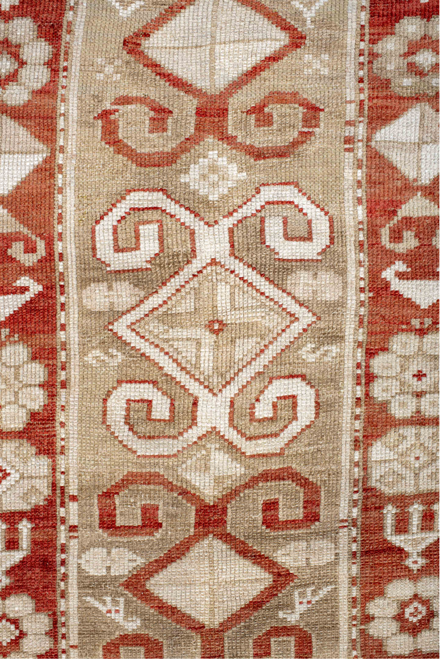 4' x 9' one-of-a-kind handmade vintage Caucasian runner rug. Color palette: brown, gray, light gray, off-white, orange, pink