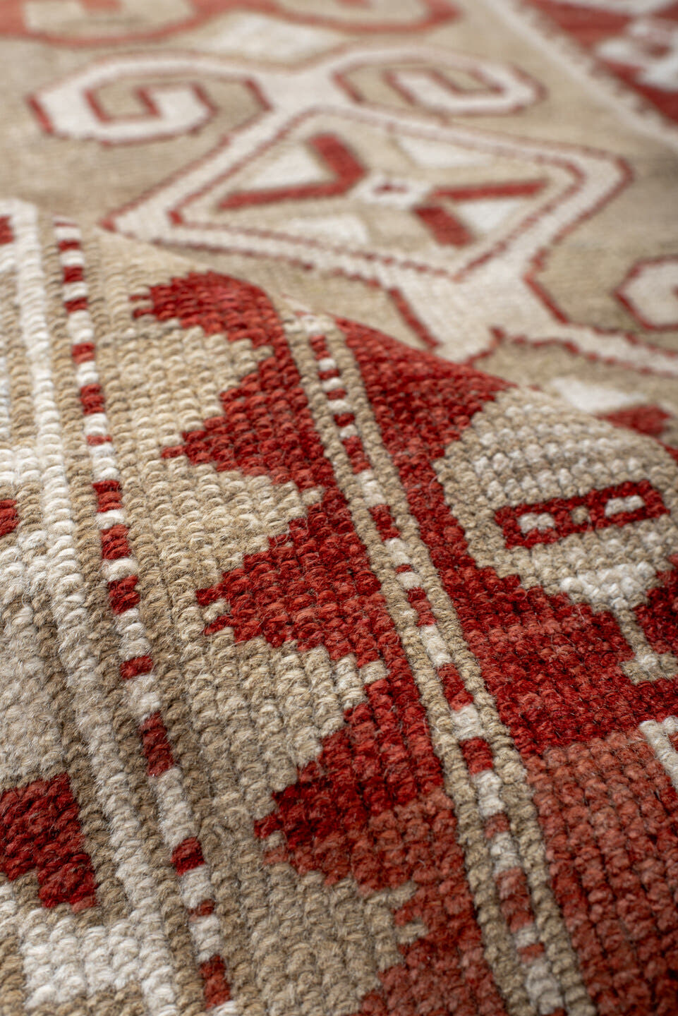 4' x 9' one-of-a-kind handmade antique Caucasian runner rug. Color palette: ivory, rust, camel, brick, beige, terracotta