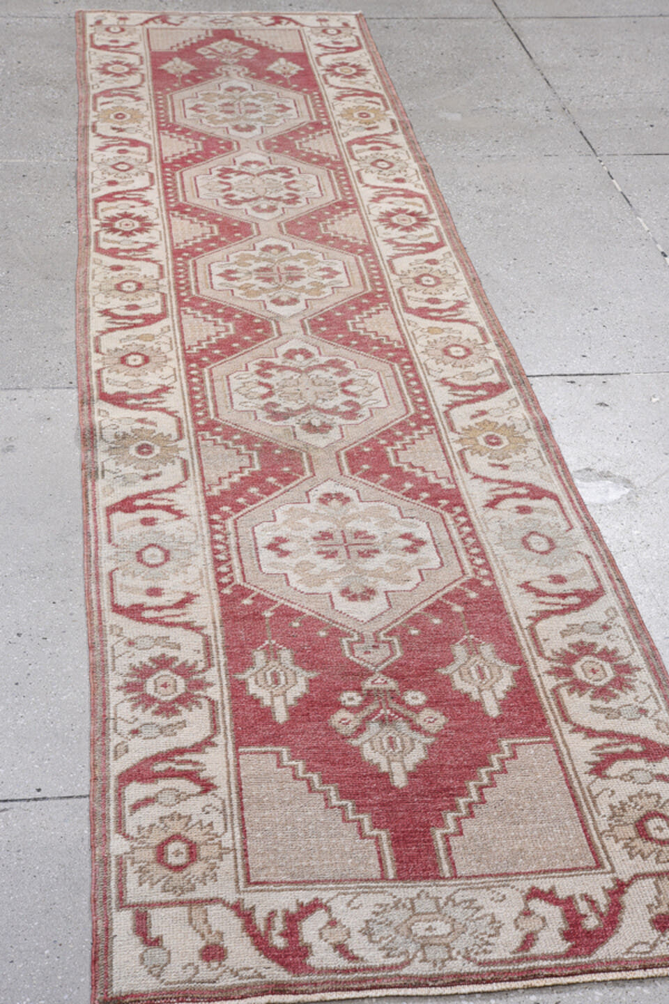 2' x 10' one-of-a-kind handmade antique Oushak runner rug. Color palette: rose, ivory, taupe, beige, rust, pink, red, gray