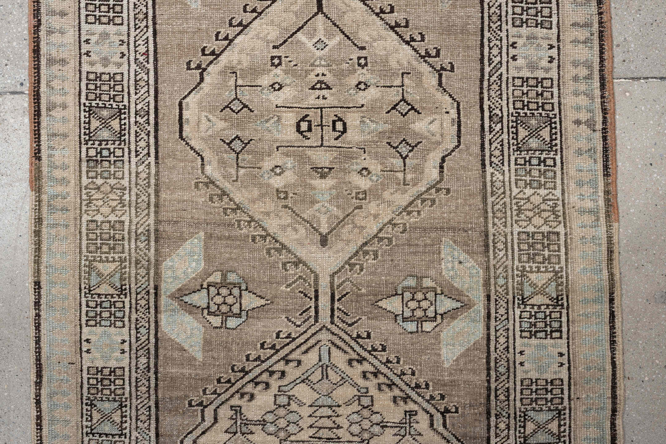 3' x 16' one-of-a-kind handmade vintage runner rug. Color palette: taupe, ivory, pale blue, camel, charcoal, beige, gray