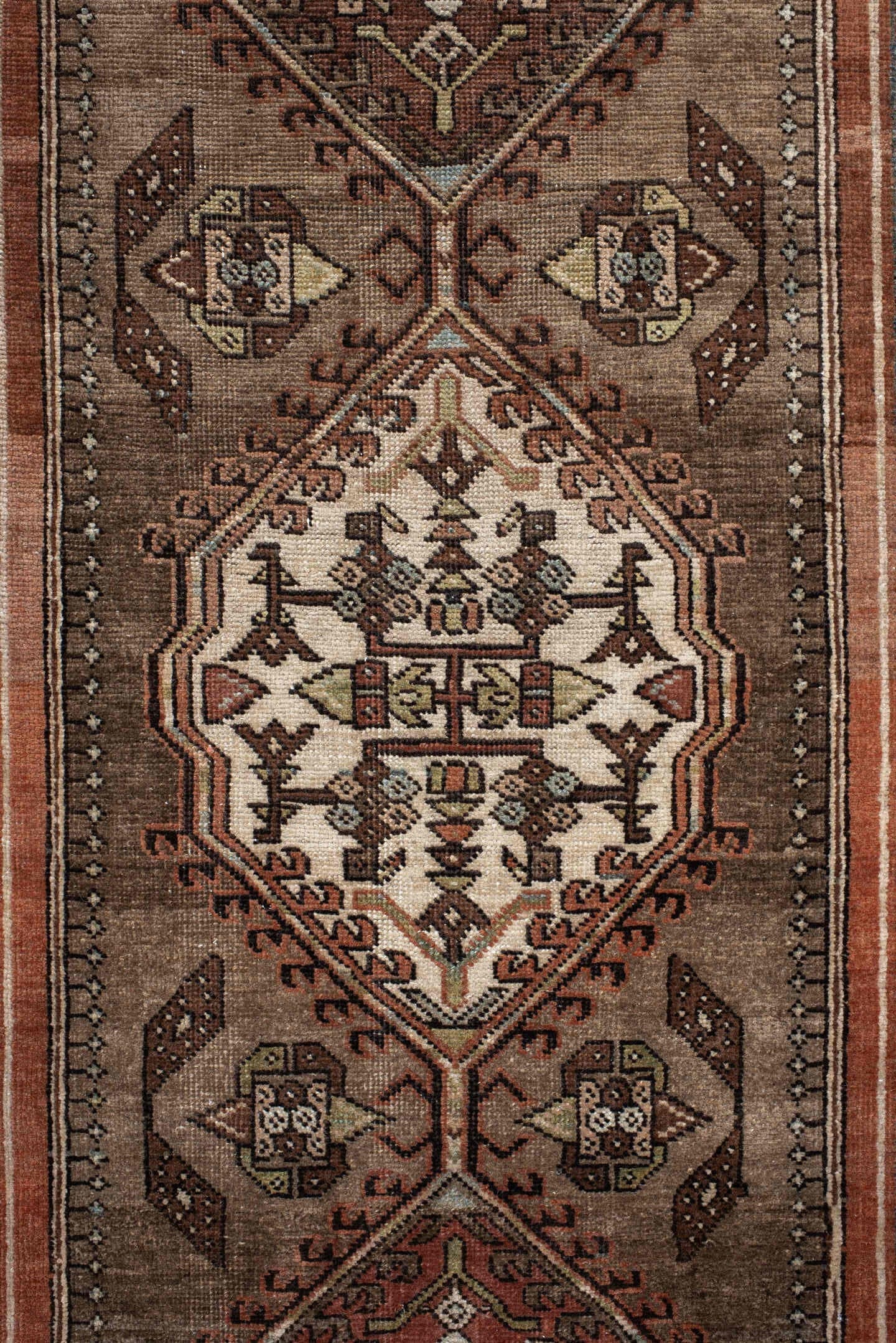 3' x 10' one-of-a-kind handmade antique Sarab runner rug. Color palette: taupe, camel, rust, ivory, brown, sage, slate