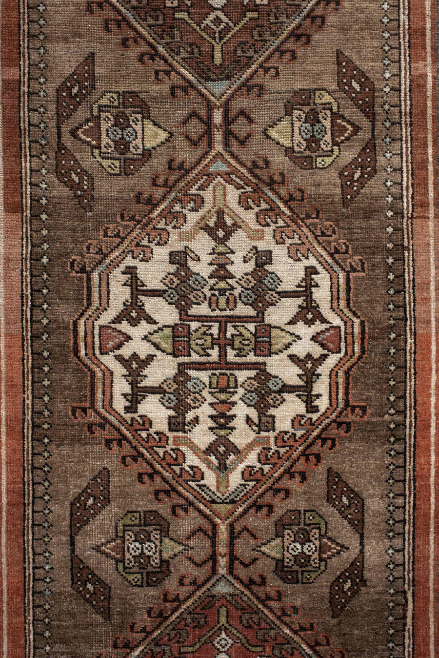 3' x 10' one-of-a-kind handmade antique Sarab runner rug. Color palette: taupe, camel, rust, ivory, brown, sage, slate