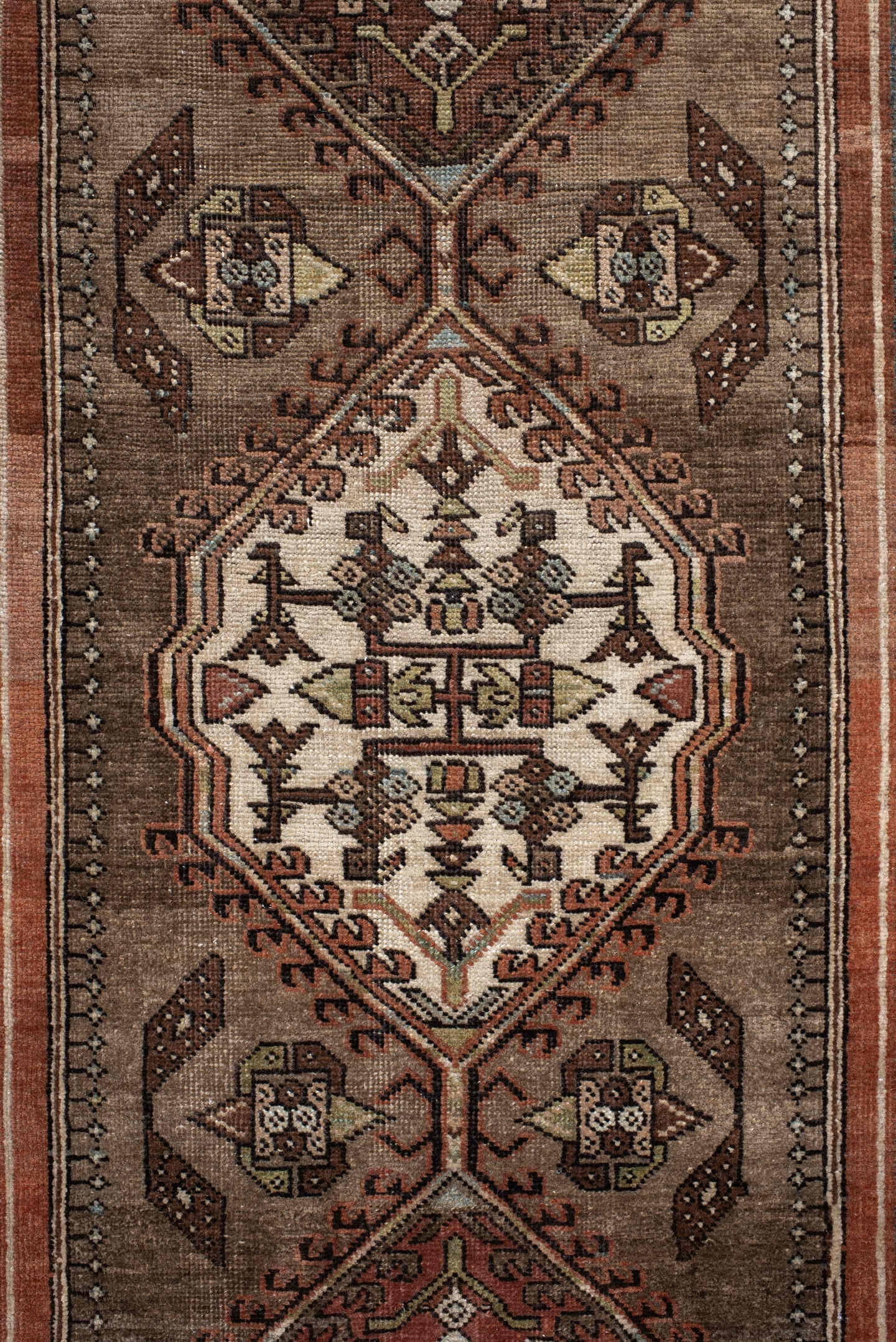3' x 10' one-of-a-kind handmade antique Sarab runner rug. Color palette: taupe, camel, rust, ivory, brown, sage, slate